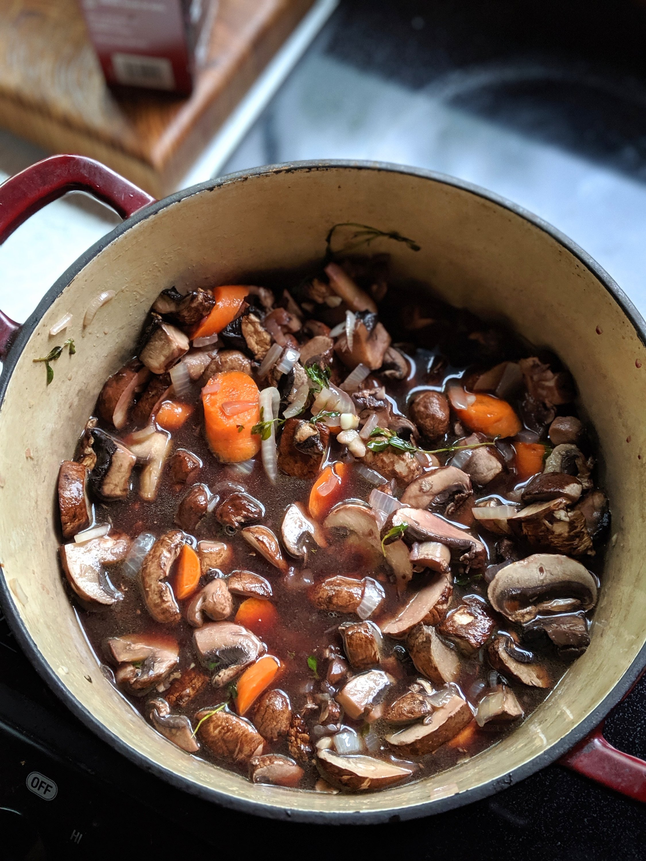 gluten free Mushroom Bourguignon Recipe with red wine mushroom stew vegan fresh recipes with carrots root vegetable buirguignon at home plant based