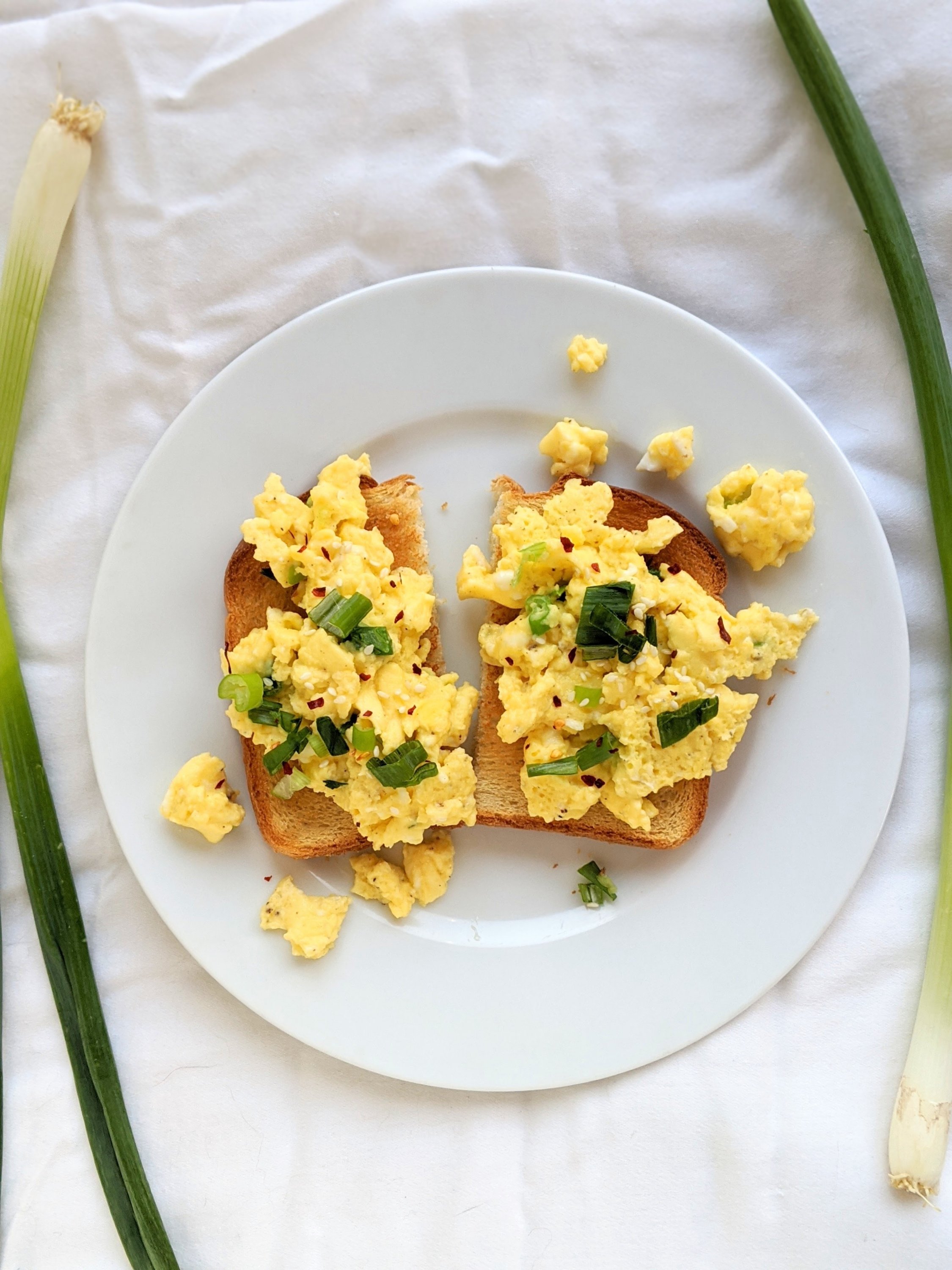 scrambled eggs without milk green onion eggs with red chili flakes eggs with sour cream yogurt almond milk or ricotta cheese