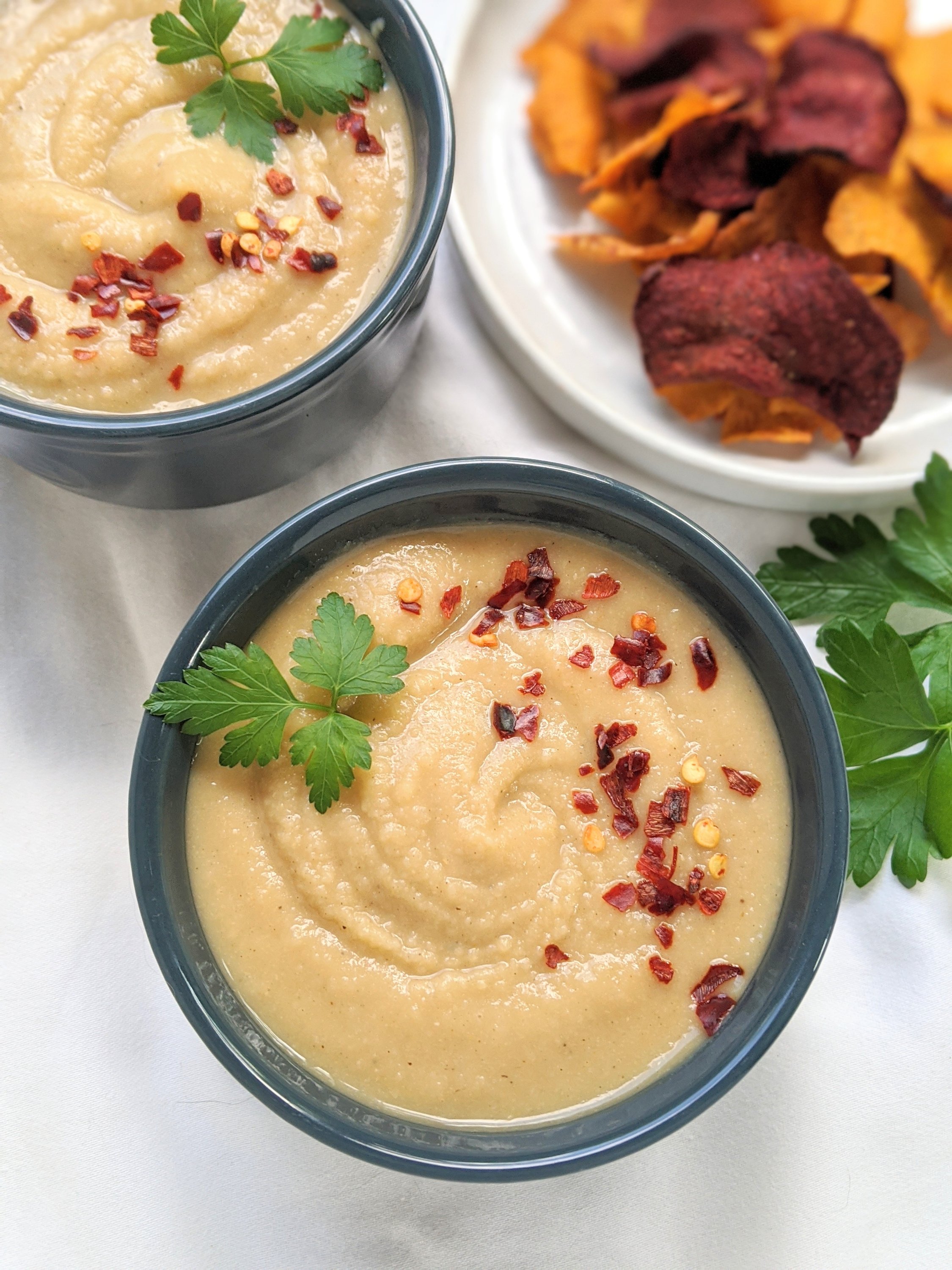 tahini free hummus pressure cooker recipes with vegetable chips and parsley for garnish