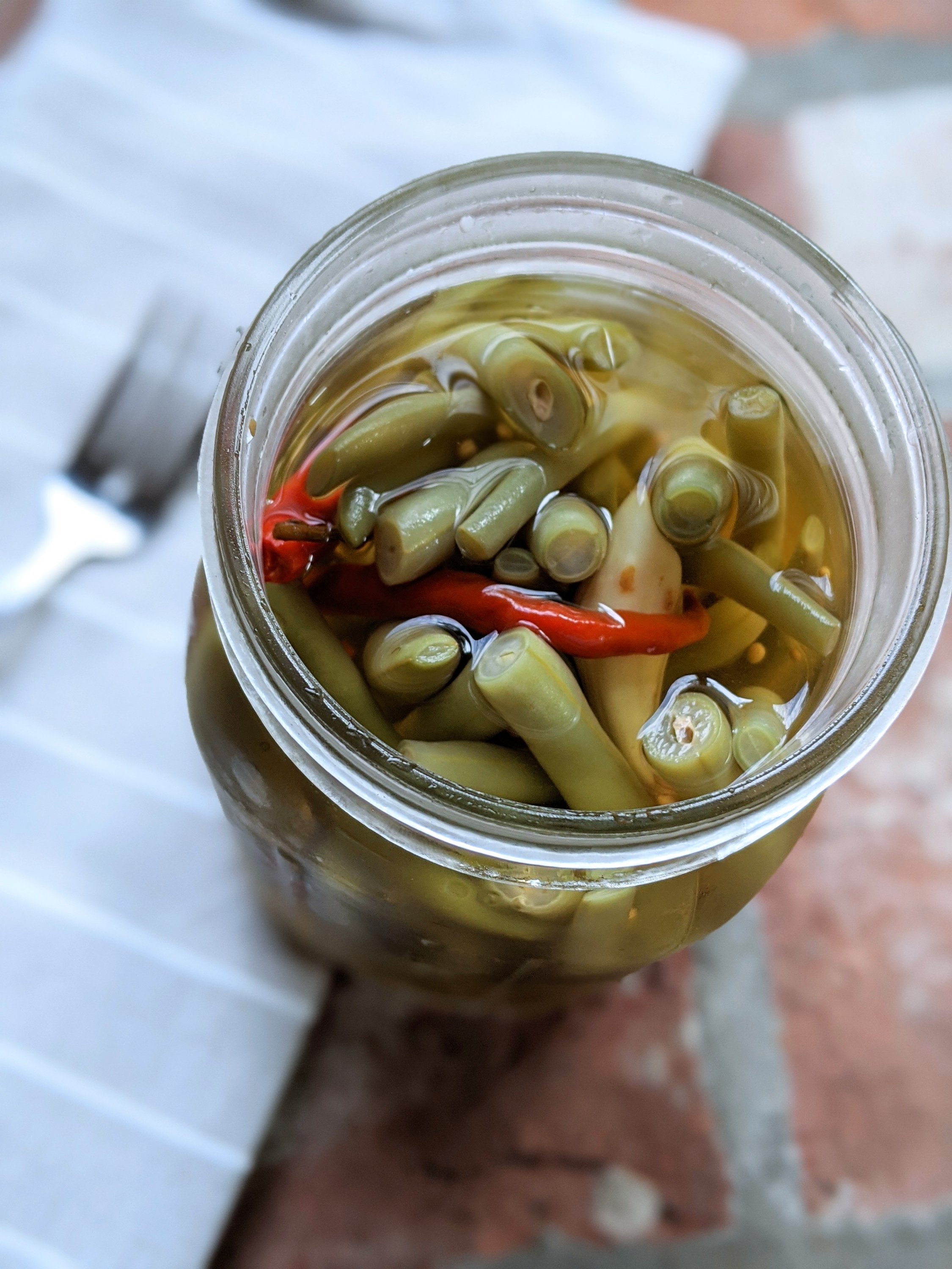 make spicy beans for cocktails caesars and bloody marys add spicy pickled green beans to your drinks