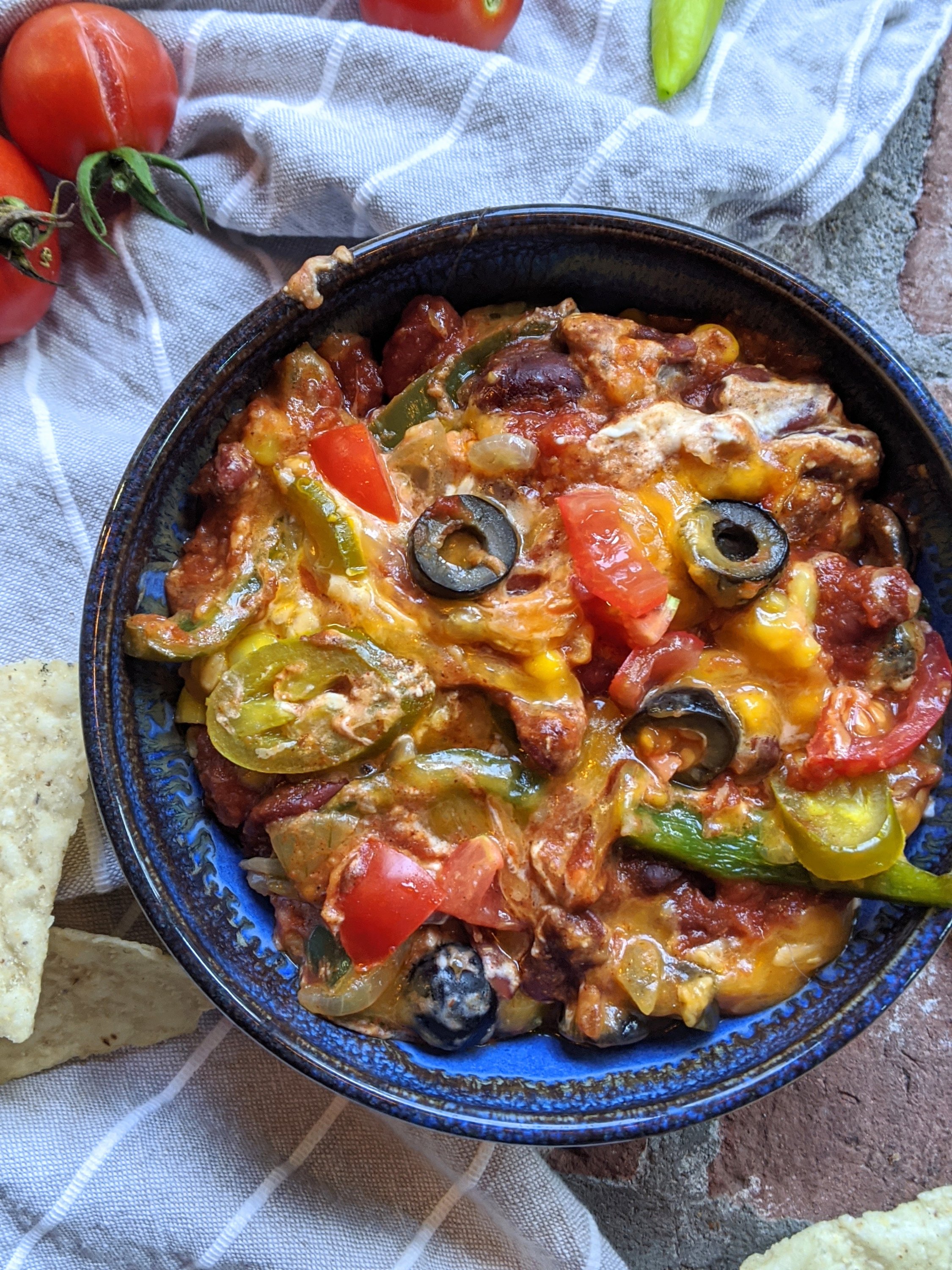 vegan 7 layer dip healthy high protein dairy free vegetarian gluten free dairy free loaded with vegetables olives jalapenos chili cream cheese salsa beans
