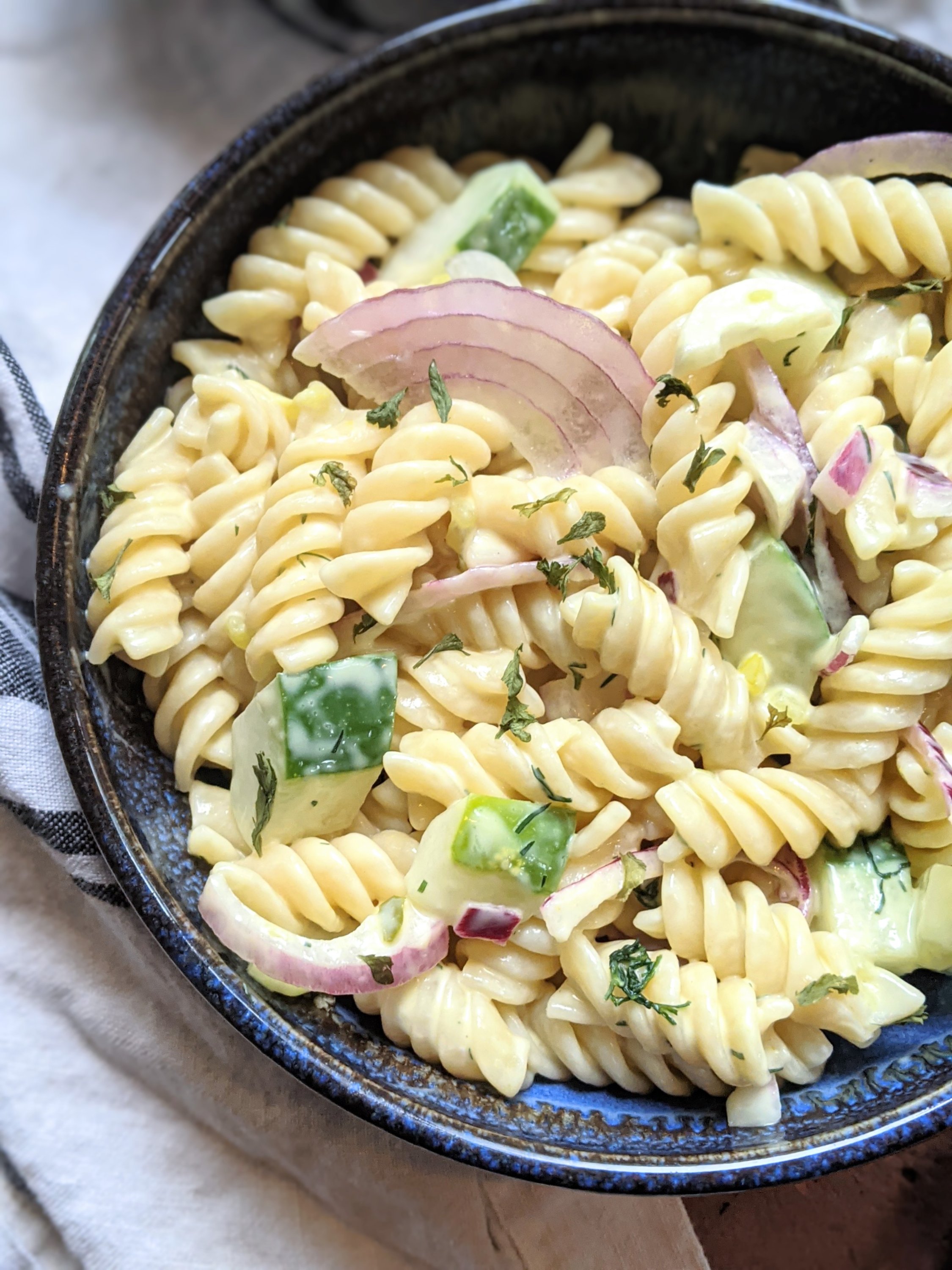 vegan creamy pasta salad recipe homemade with cucumbers from garden recipe healthy easy homemade meal prep make ahead pasta salad for summer bbq 