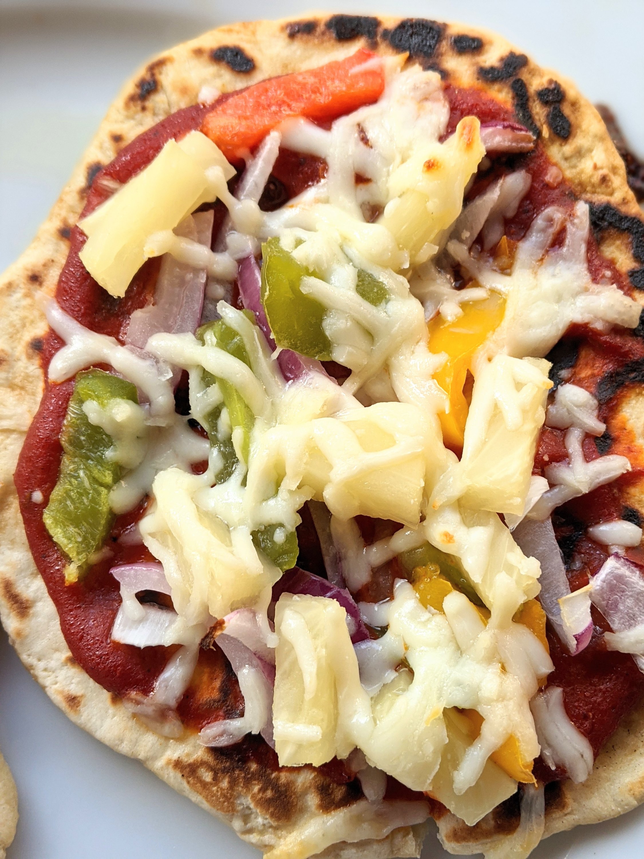 hawaiian pizza with naan crust pineapple pizzas onions bell pepper roasted cheese or vegan cheese and onion slices healthy veggie naan pizza recipe