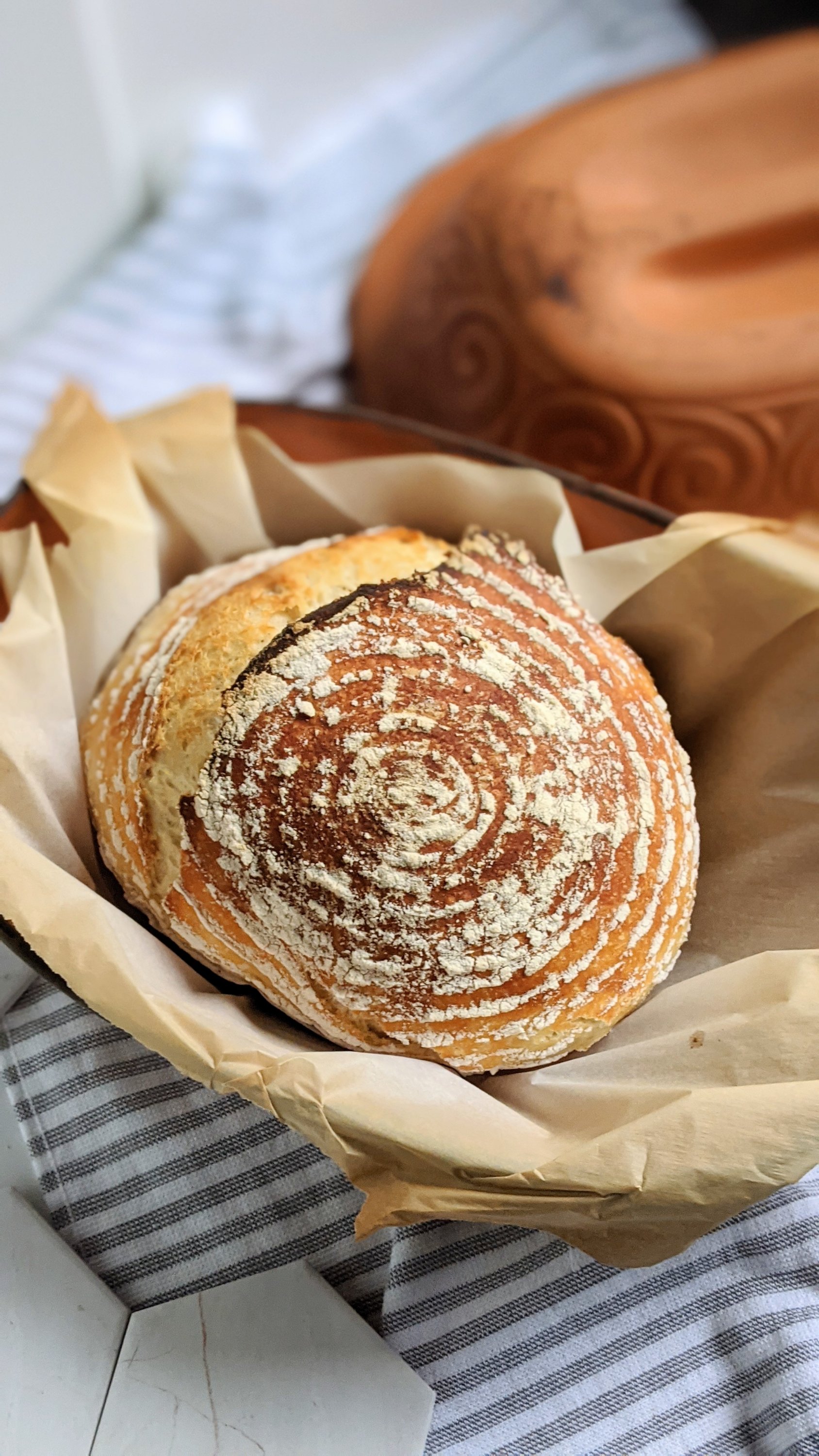 Baking sourdough bread in clay baker - Sourdough&Olives