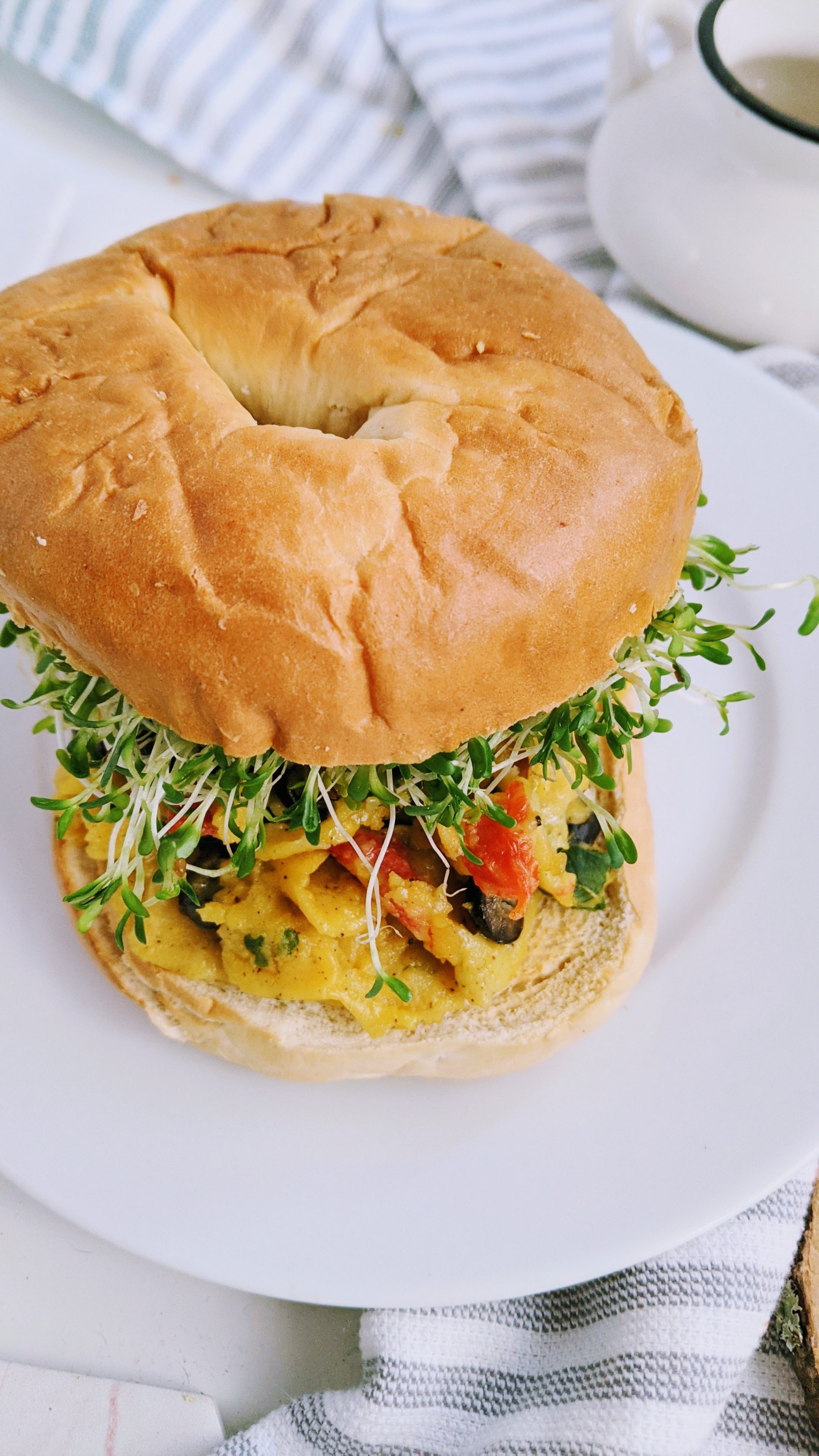 vegan breakfast sandwich with chickpeas garbanzo beans gluten free high protein breakfasts vegan plant based chickpea flour omelette sandwich recipe with sprouts healthy breakfasts
