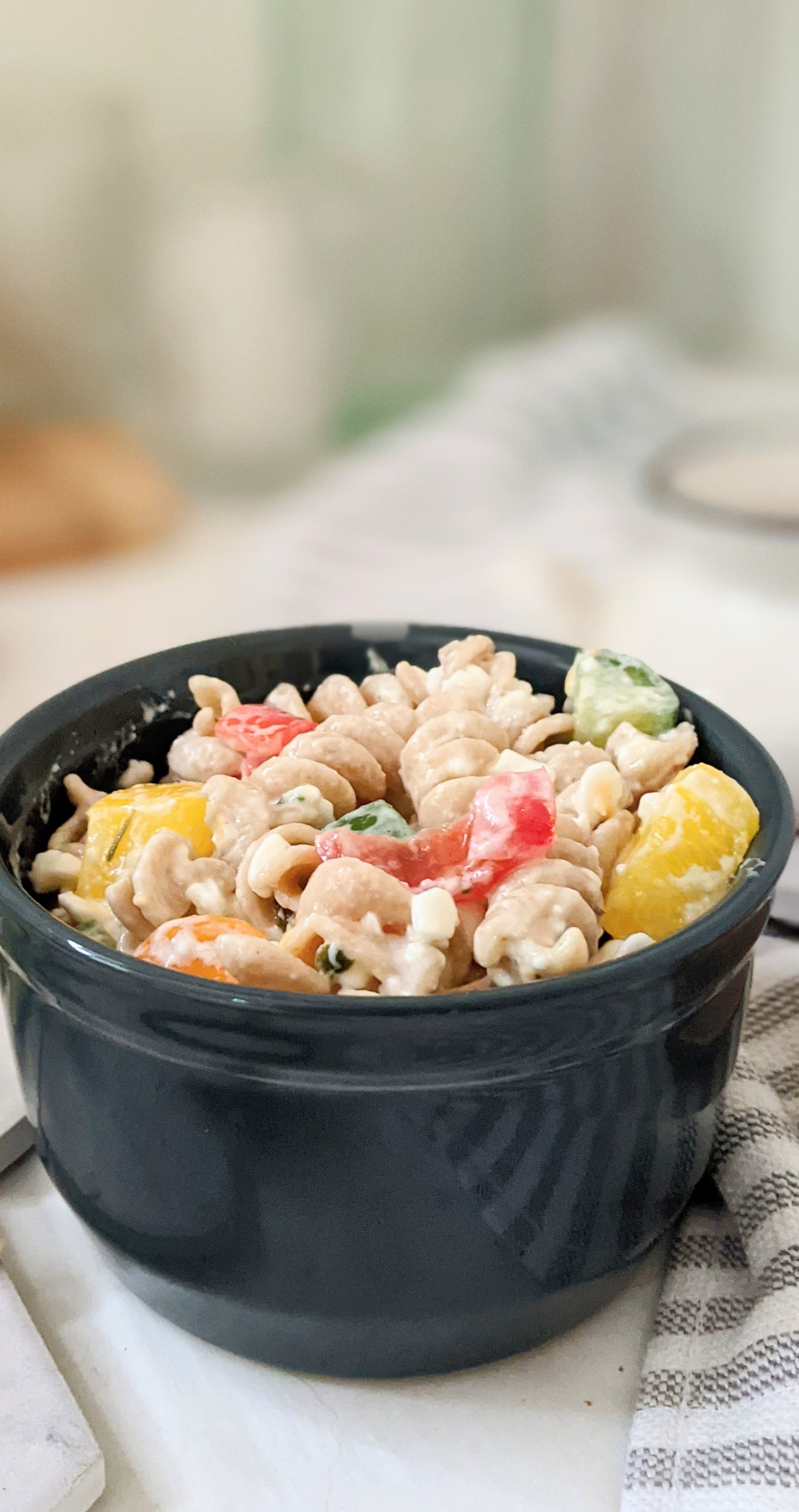 creamy cottage pasta salad with gluten free rotini and summer garden tomatoes and cucumbers and bell pepper and cottage cheese salad with a lemon italian dressing tangy pasta salads no mayo