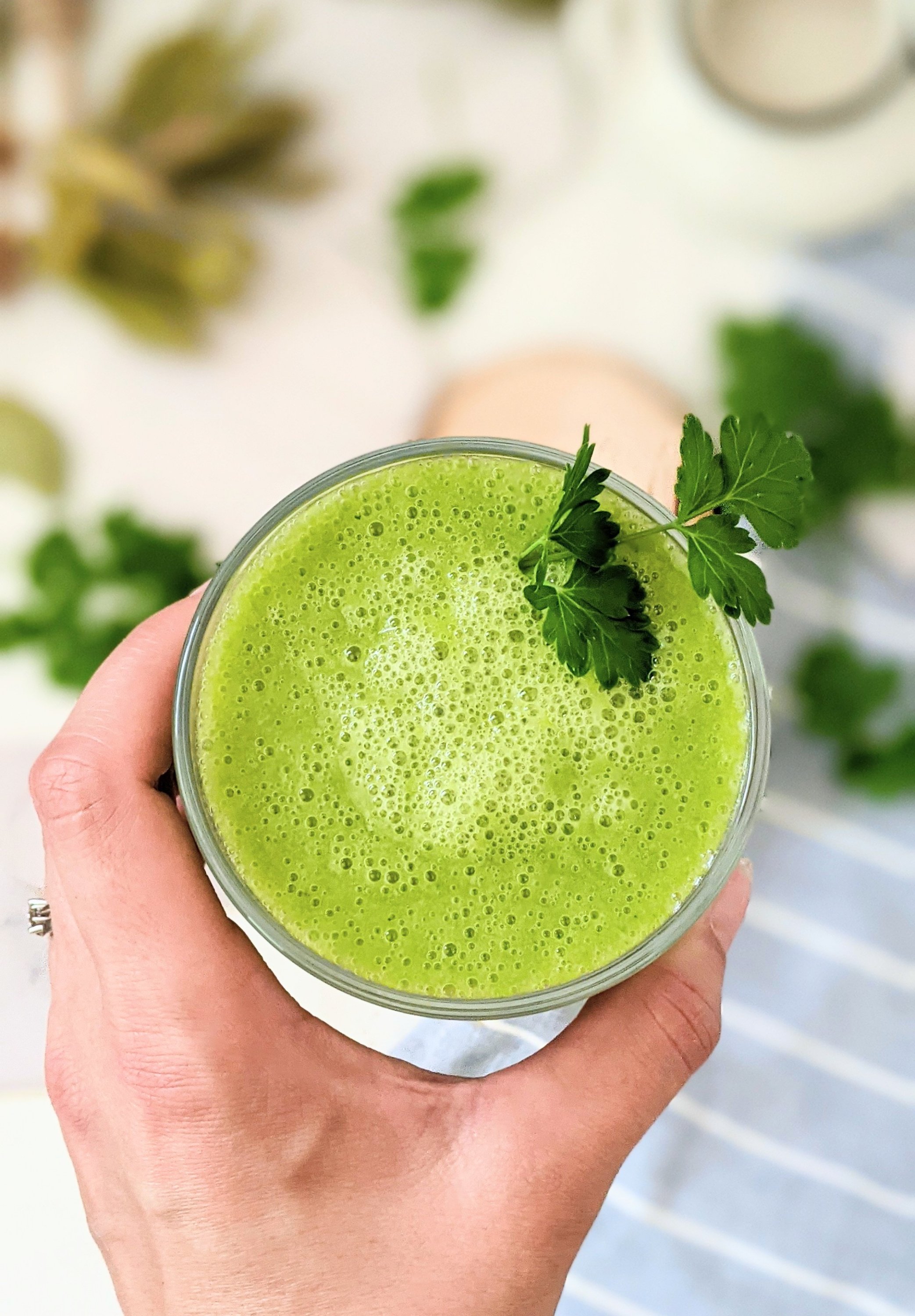 parsley smoothie benefits with orange gut healthy protein powder and frozen kale smoothies with frozen mangoes for breakfast with banana and chia seeds