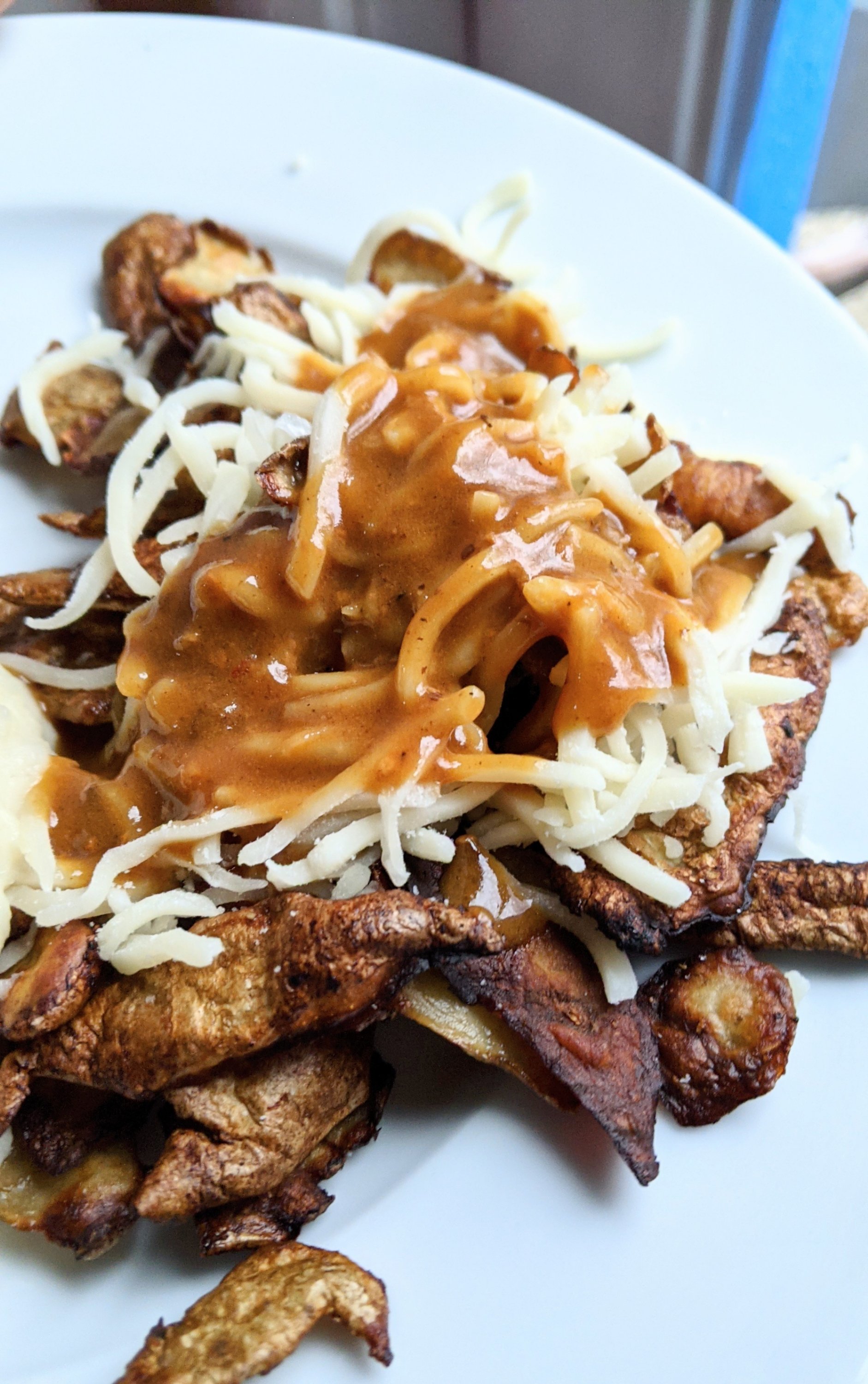 cheater poutine with potato peels in recipes can i save potato peels to eat healthy ways to eat peels from potatoes and turn them into poutine with st. hubert gravy and mozzarella