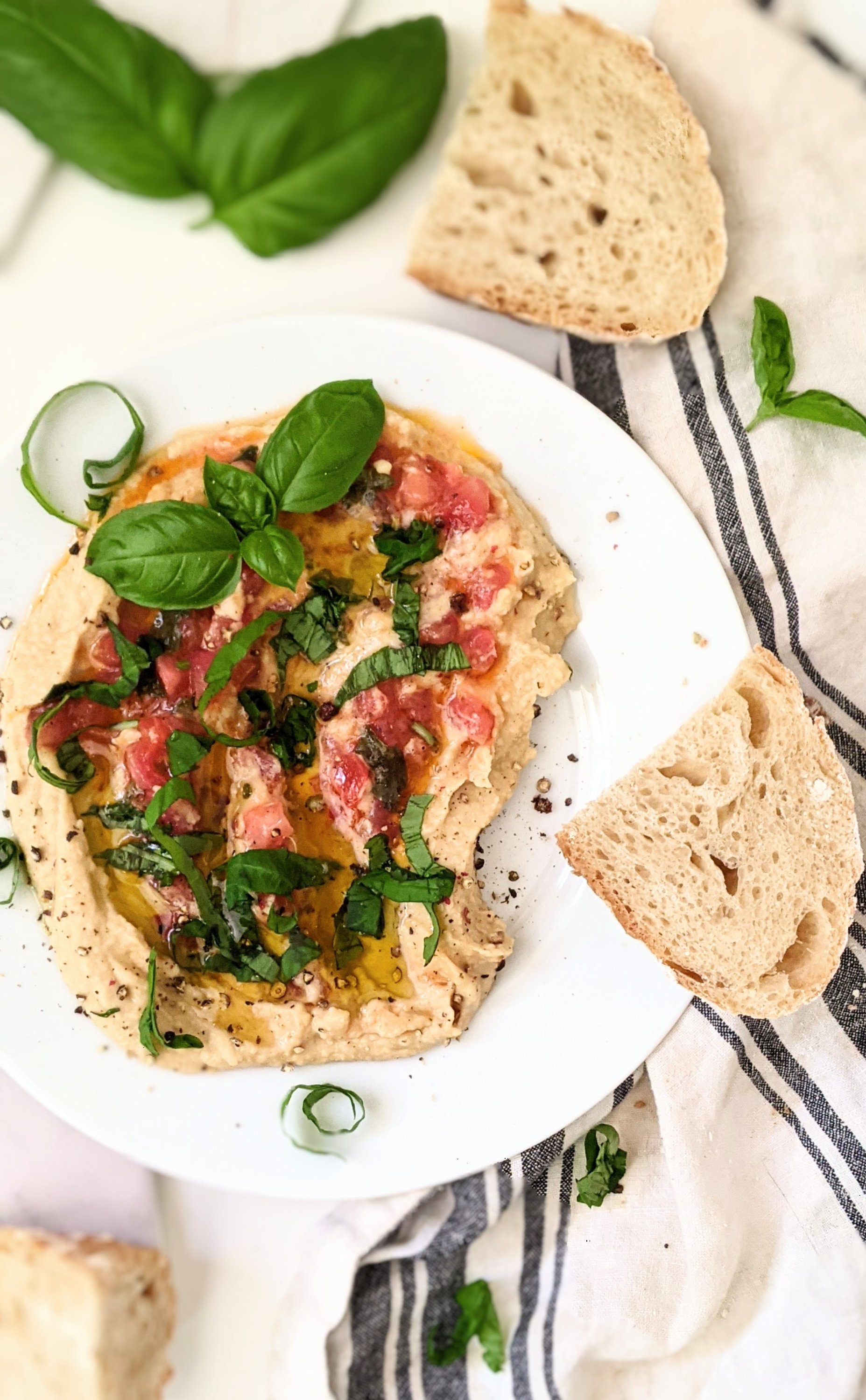 bruschetta hummus recipe vegan gluten free plant-based summer side dishes no cook appetizers for entertaining dinner side dishes with tomato bruschetta humous