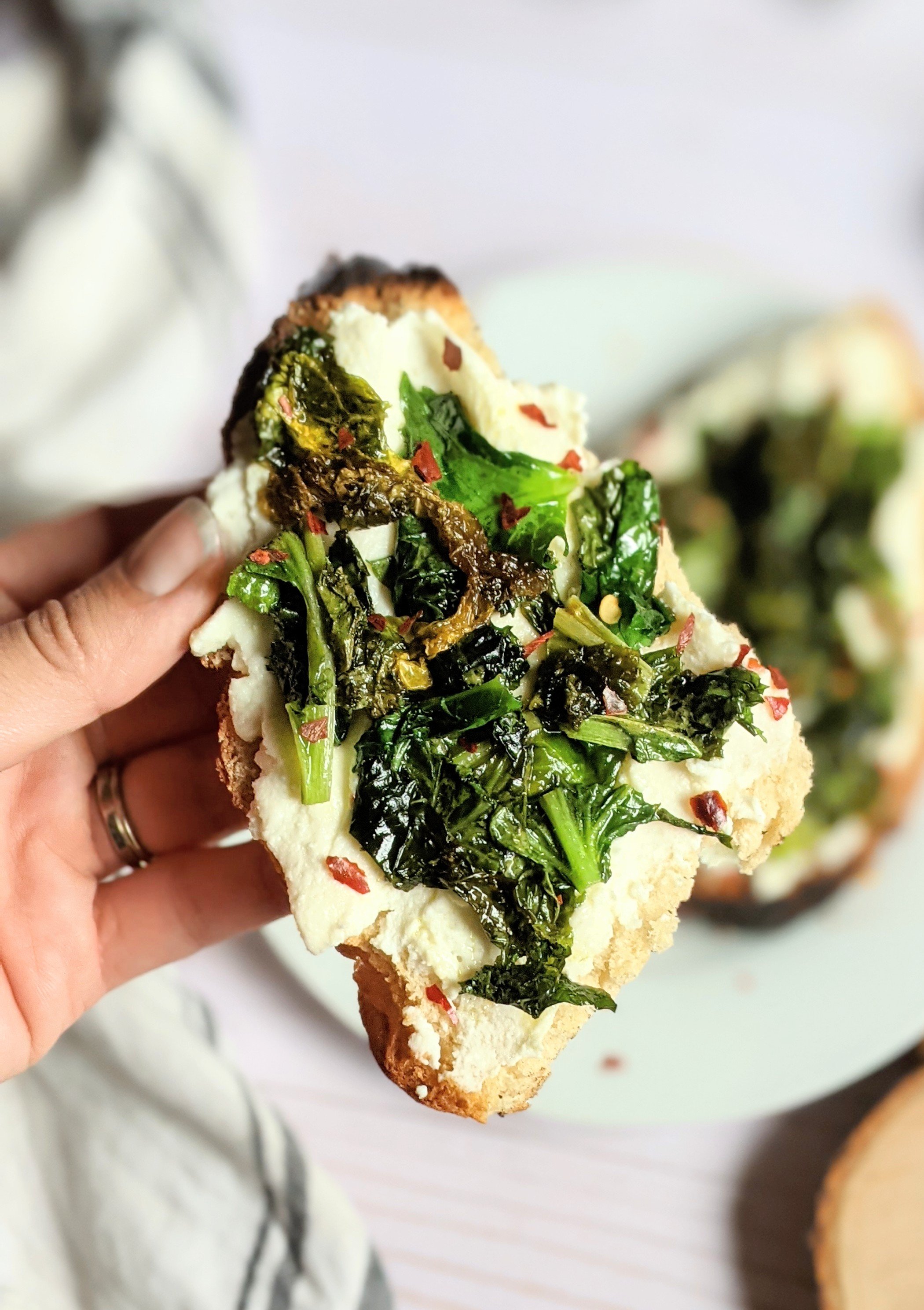 breakfast kale recipes healthy brunch ideas with kale ricotta toast recipes ricotta cheese on toasted gluten free bread with sauteed garlic and kale topped with chili pepper flakes vegetarian meatless brunch toast ideas