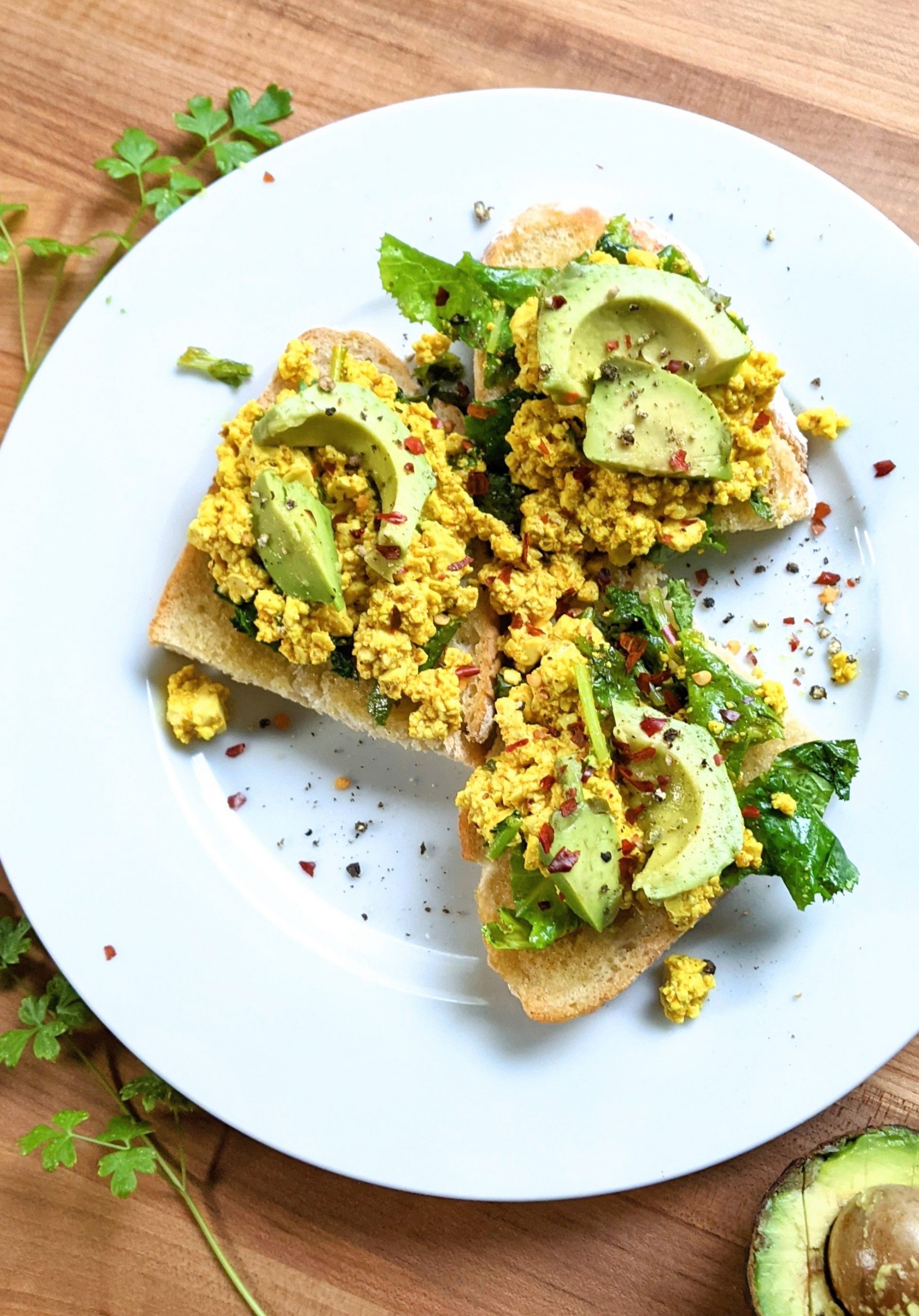 vegan high protein breakfast ideas silken tofu scramble recipe turmeric kale spices and avocado