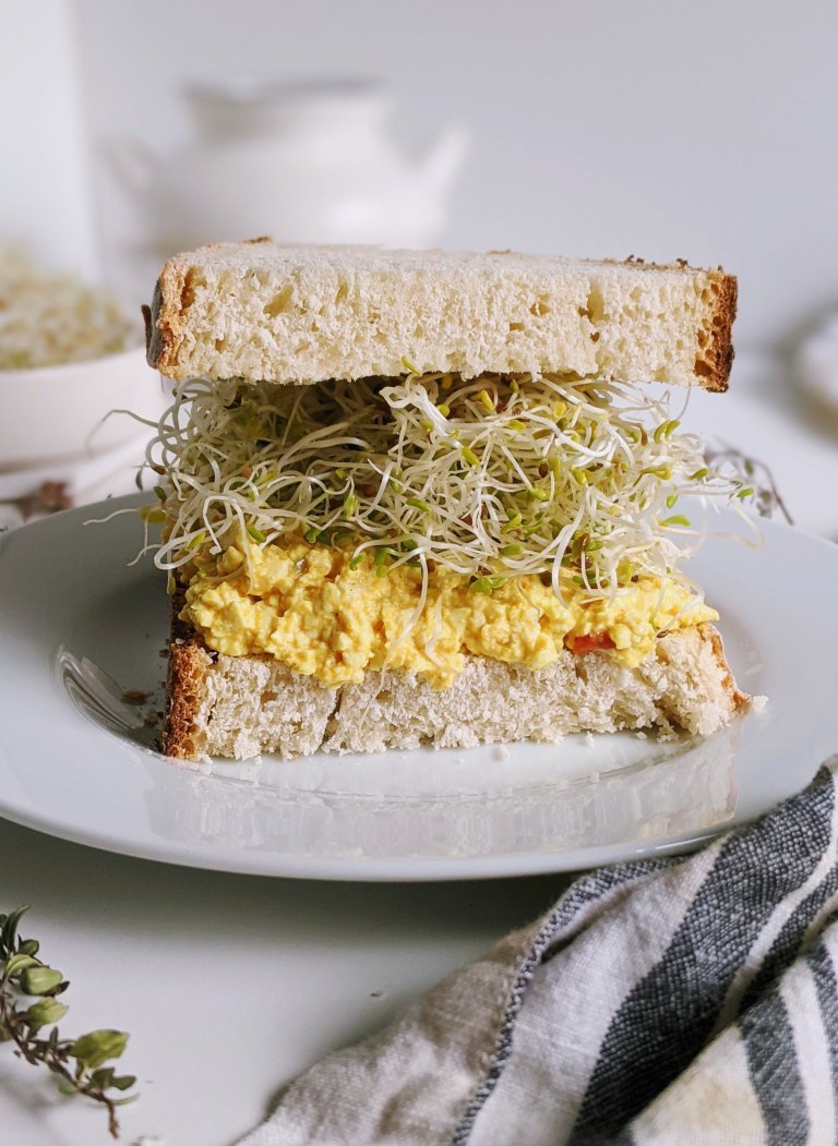 vegan tofu egg salad without mayo recipe tahini tofu salad sandwich with sprouts celery bell pepper and spices