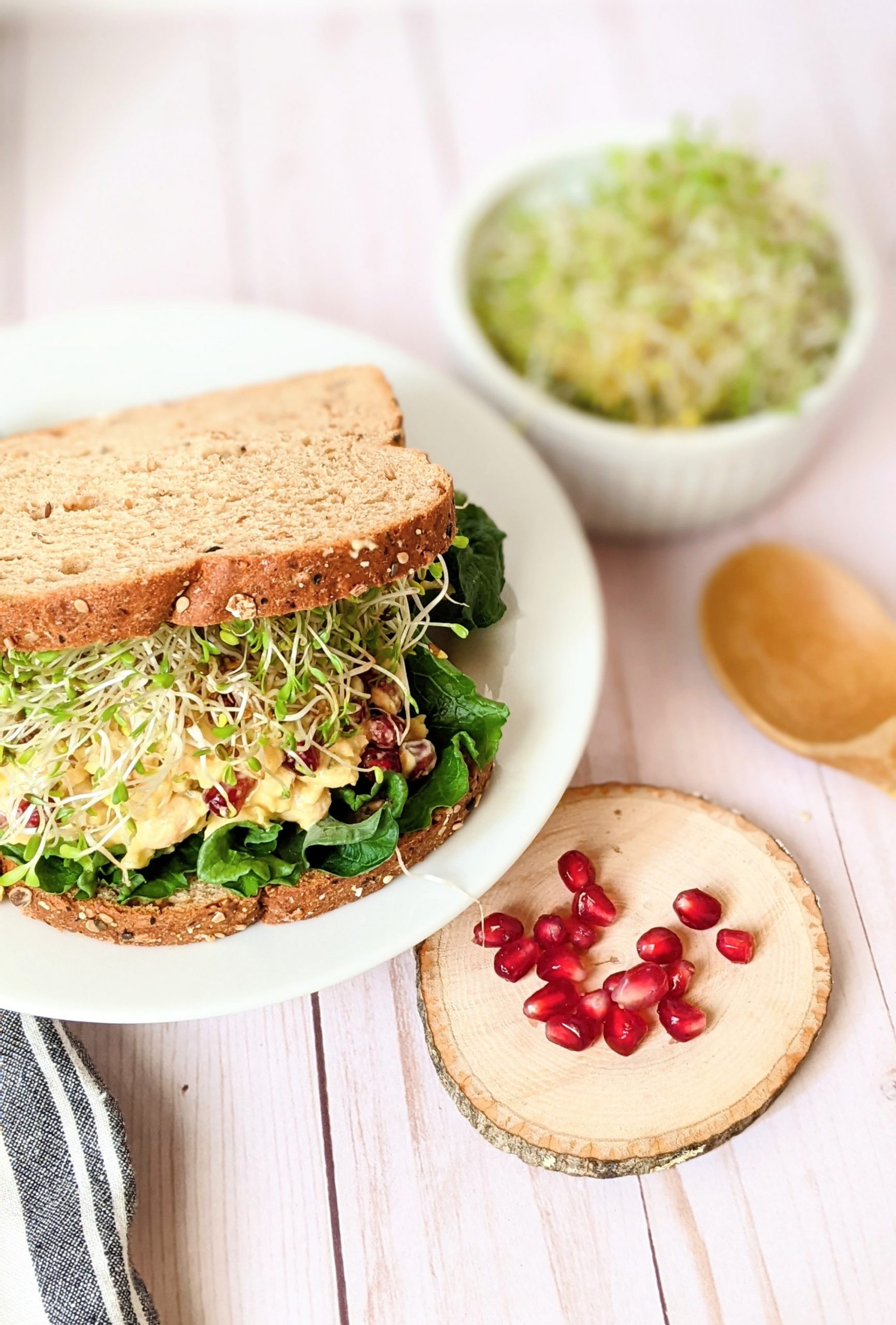 chickpea salad with pomegranate seeds mayo mustard lettuce alfalfa sprouts and relish sandwich recipe vegan gluten free
