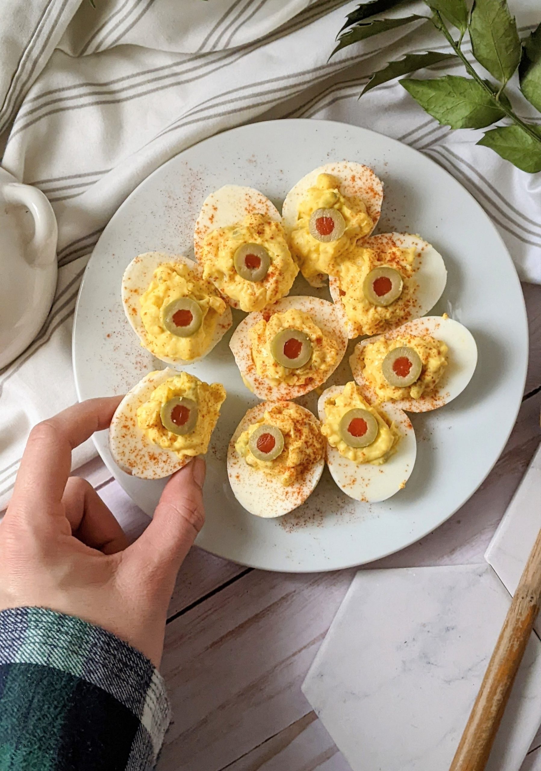 green olive deviled eggs with chopped olives in the filling gluten free high protein appetizers with olives and egg recipes vegetarian party good retro recipes