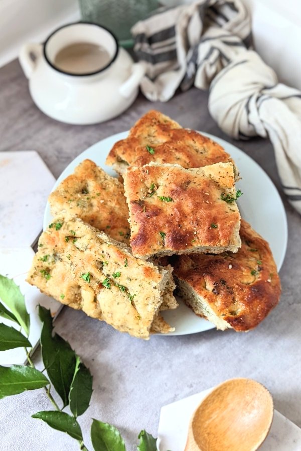 herb focaccia bread recipe with italian herbs parsley rosemary oregano thyme and garlic with olive oil and sugar