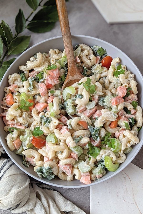 macaroni salad with ranch dressing vegetarian gluten free ranch pasta salad recipe with a spoon taking noodles.