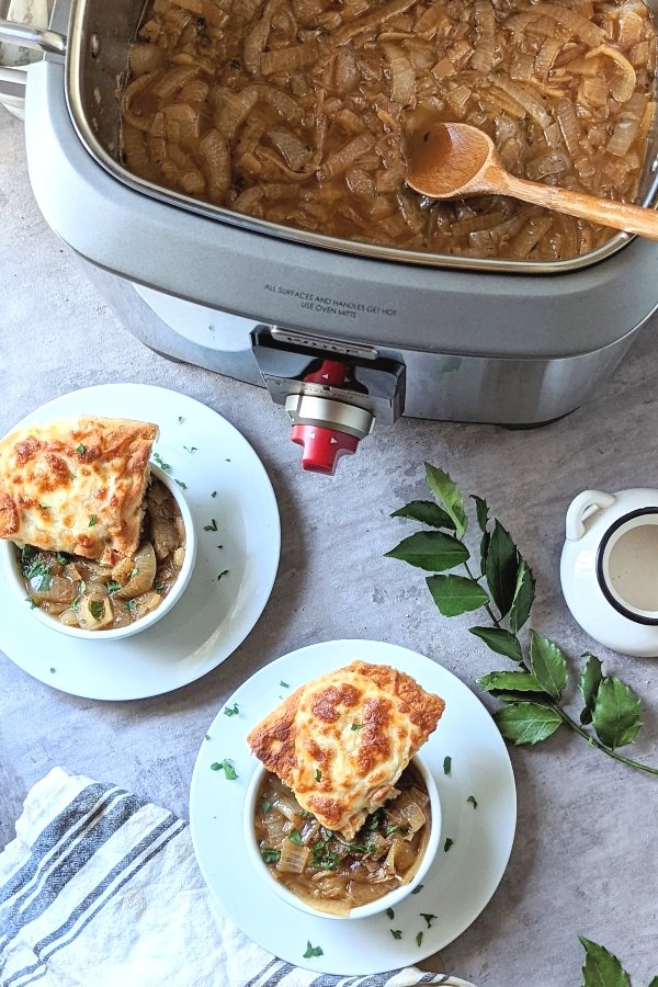 slow cooker french onion soup with caramelized onions and white wine butter and gruyere cheese in the crock pot from wolf gourmet.