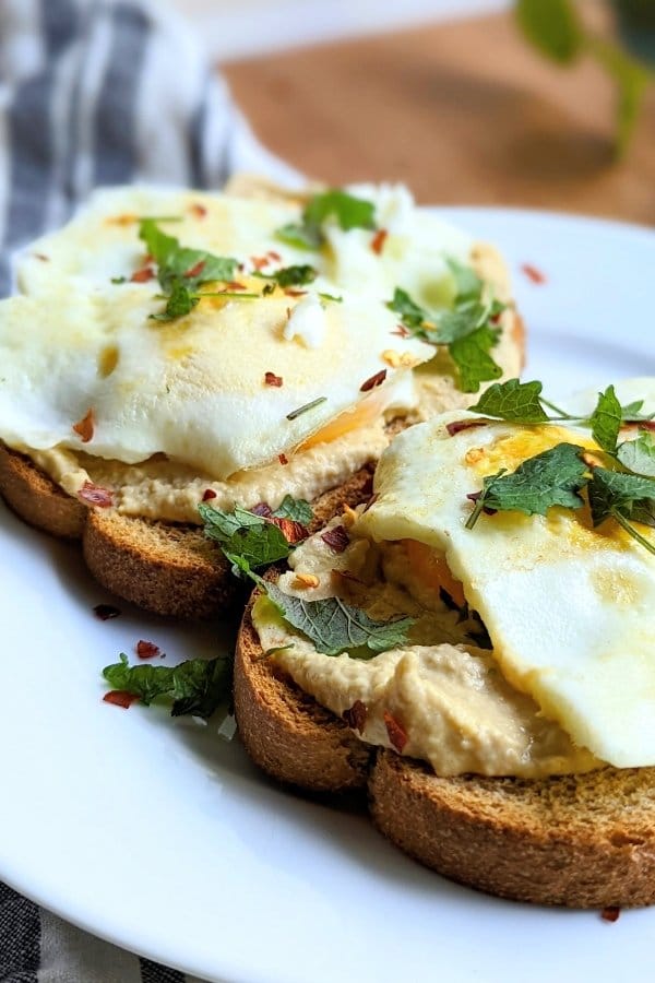 breakfast hummus eggs recipe healthy high protein hummus brunch ideas with eggs and whole grain toast.