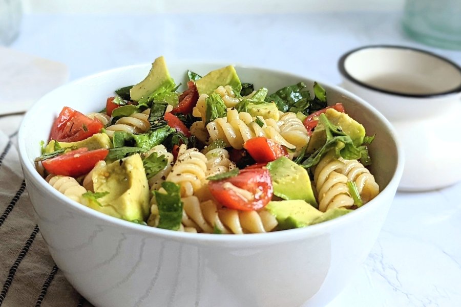 avocado tomato pasta salad recipe vegan caprese salad with noodles healthy plant-based caprese pasta salad vegan vegetarian gluten free options no cheese