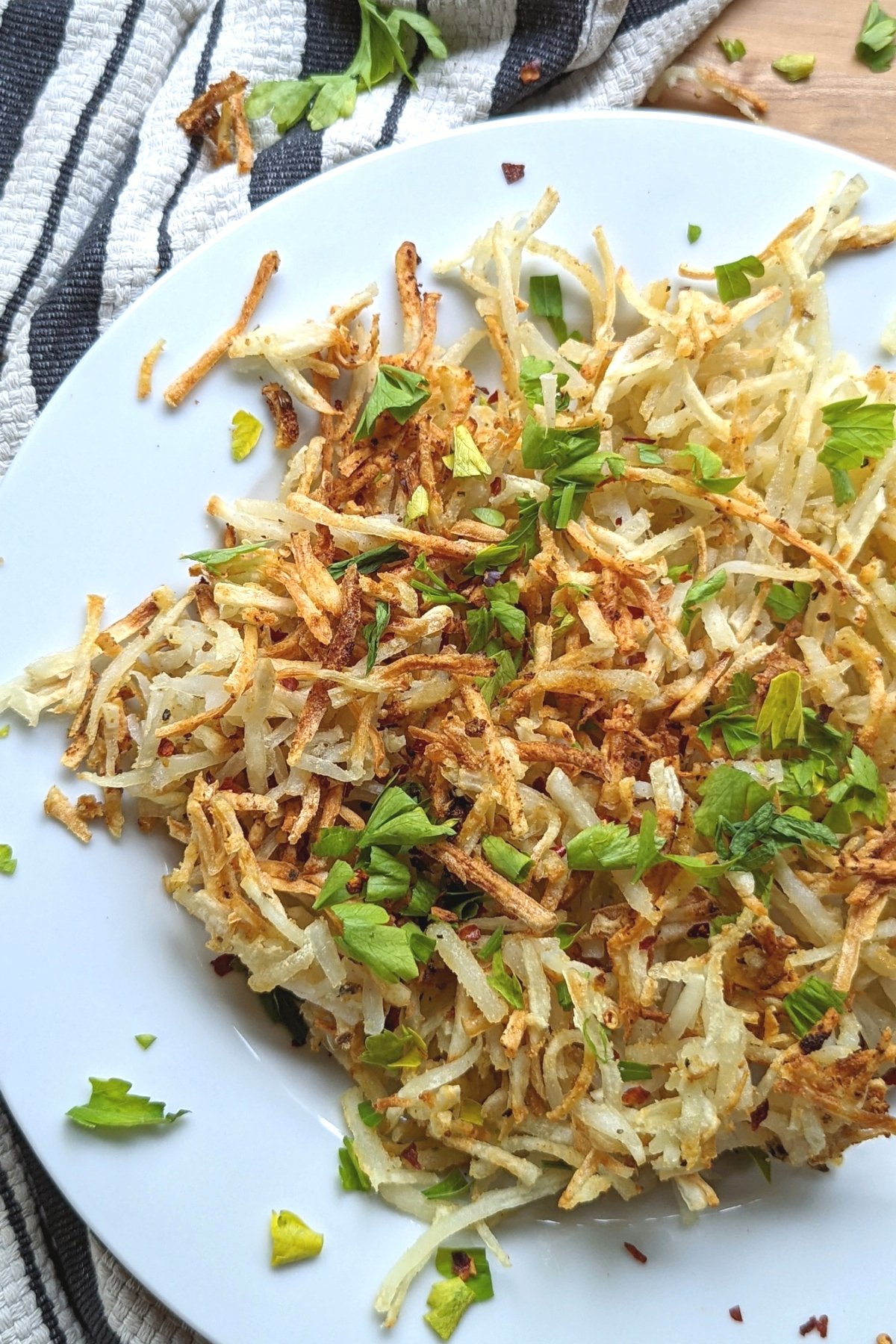 airfryer hash browns recipe frozen hash browns air fryer recipe air fried shredded potatoes with parsley and spices and oil