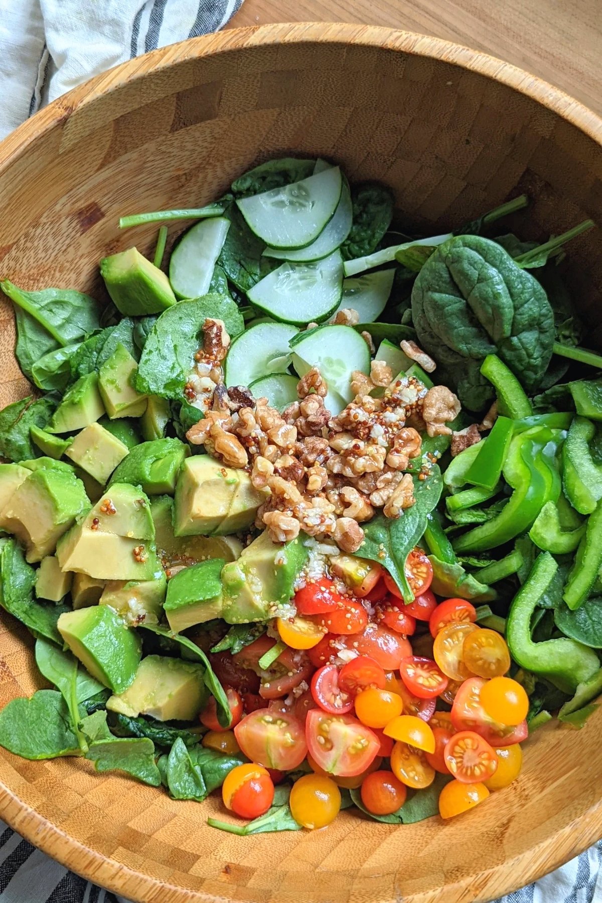 spinach tomato salad with avocado vegan salad recipe with baby spinach greens plant based dairy free spinach recipe