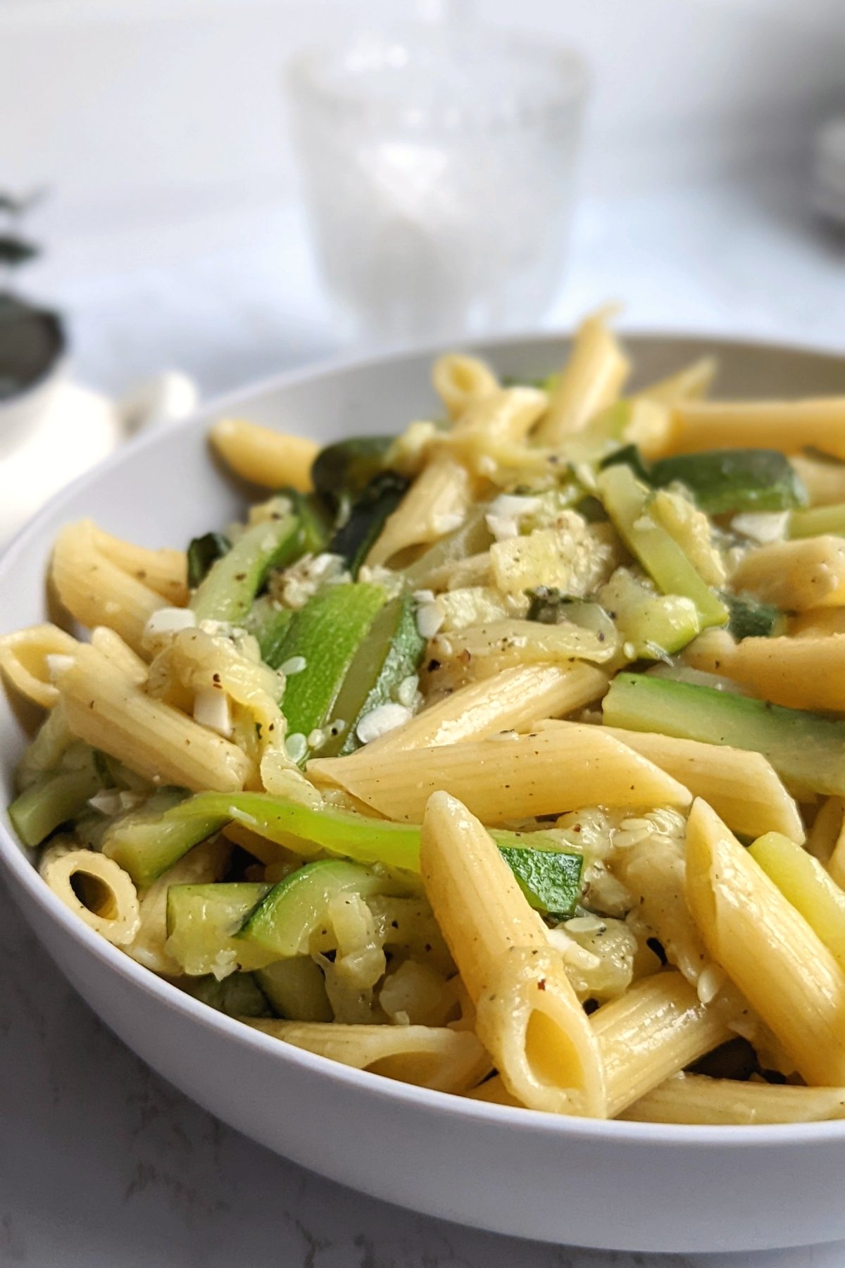 zummer squash pasta recipe with zucchini in butter sauce noodles and olive oil with vegetables in 30 minutes plant based and meatless summer dinner ideas