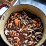 gluten free Mushroom Bourguignon Recipe with red wine mushroom stew vegan fresh recipes with carrots root vegetable buirguignon at home plant based