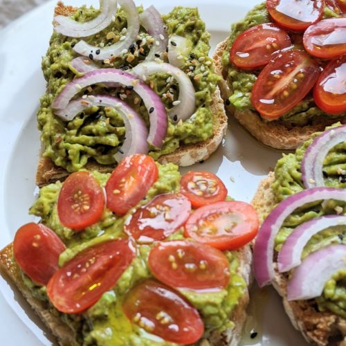 avocado toast with tomatoes and raw red onions