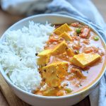 vegan indian tofu recipes todu du pyaza recipe in a bowl with basmati rice a creamy tofu curry with indian spices turmeric coriander seeds and peas
