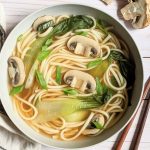 vegetarian udon noodle soup recipe with mushrooms kale boy choy and green onions delicious and creamy udon noodle soup asian inspired by japanese cuisine