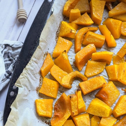 fall butternut squash recipes sweet roasted autumn squash with honey on a sheetpan with parchment paper
