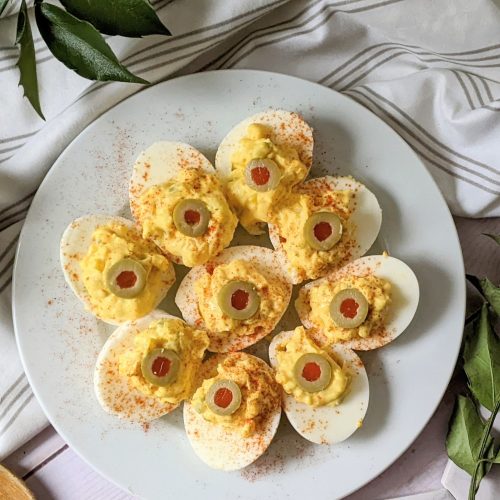 deviled eggs with green olives or greek olives mayonnaise dijon mustard paprika sweet pickle relish and mustard