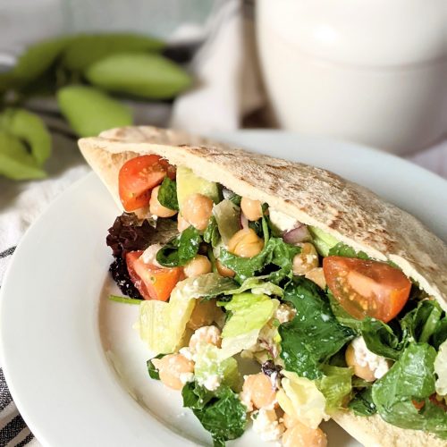 vegetarian chickpea pita wrap recipe with hummus greek hummos wrap with cucumber tomatoes feta cheese onion and red wine vinaigrette