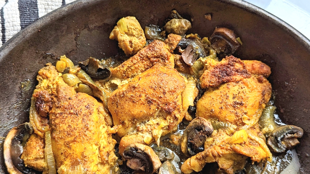 chicken with turmeric and black pepper dinner recipes healthy cast iron skillet chicken thighs with mushrooms and onions in a pan