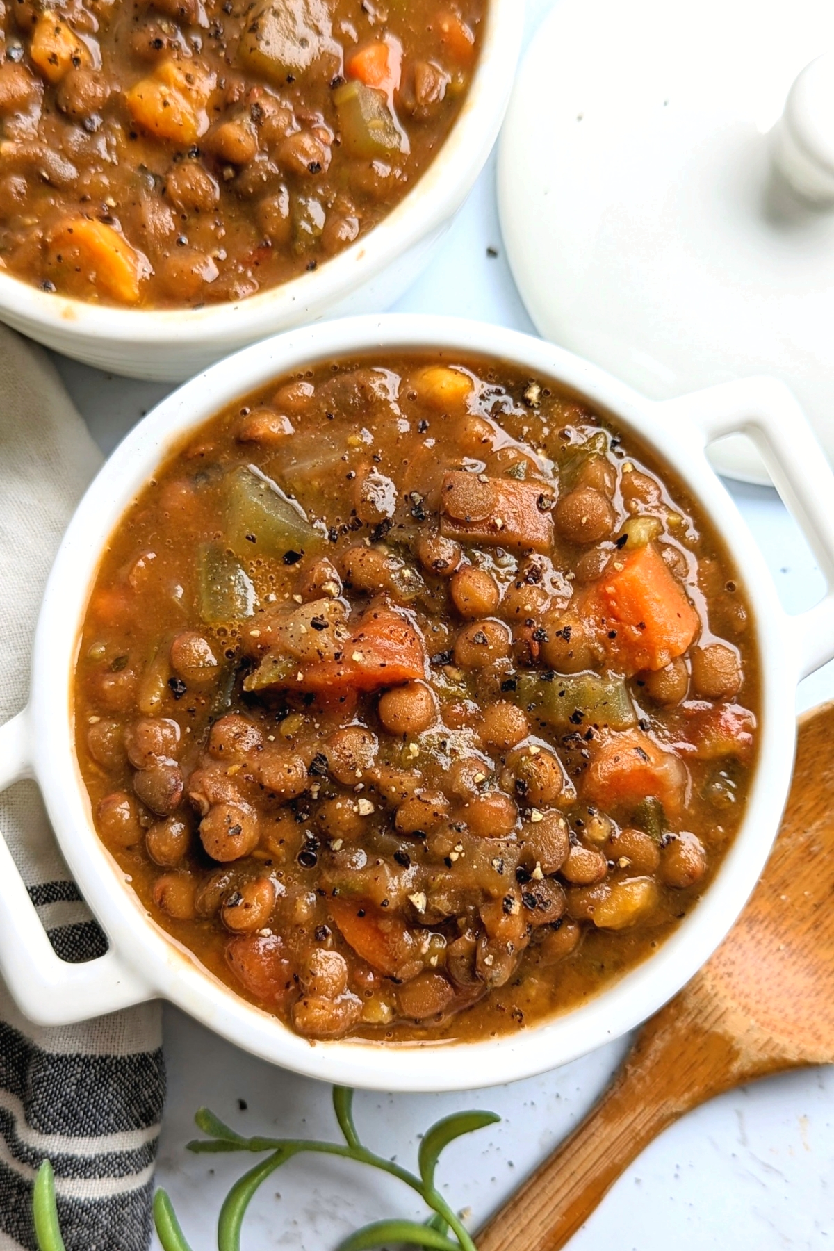 pressure cooker lentil stew recipe instant pot dinners vegetarian lentil soup ideas in a white bowl with a wooden spoon