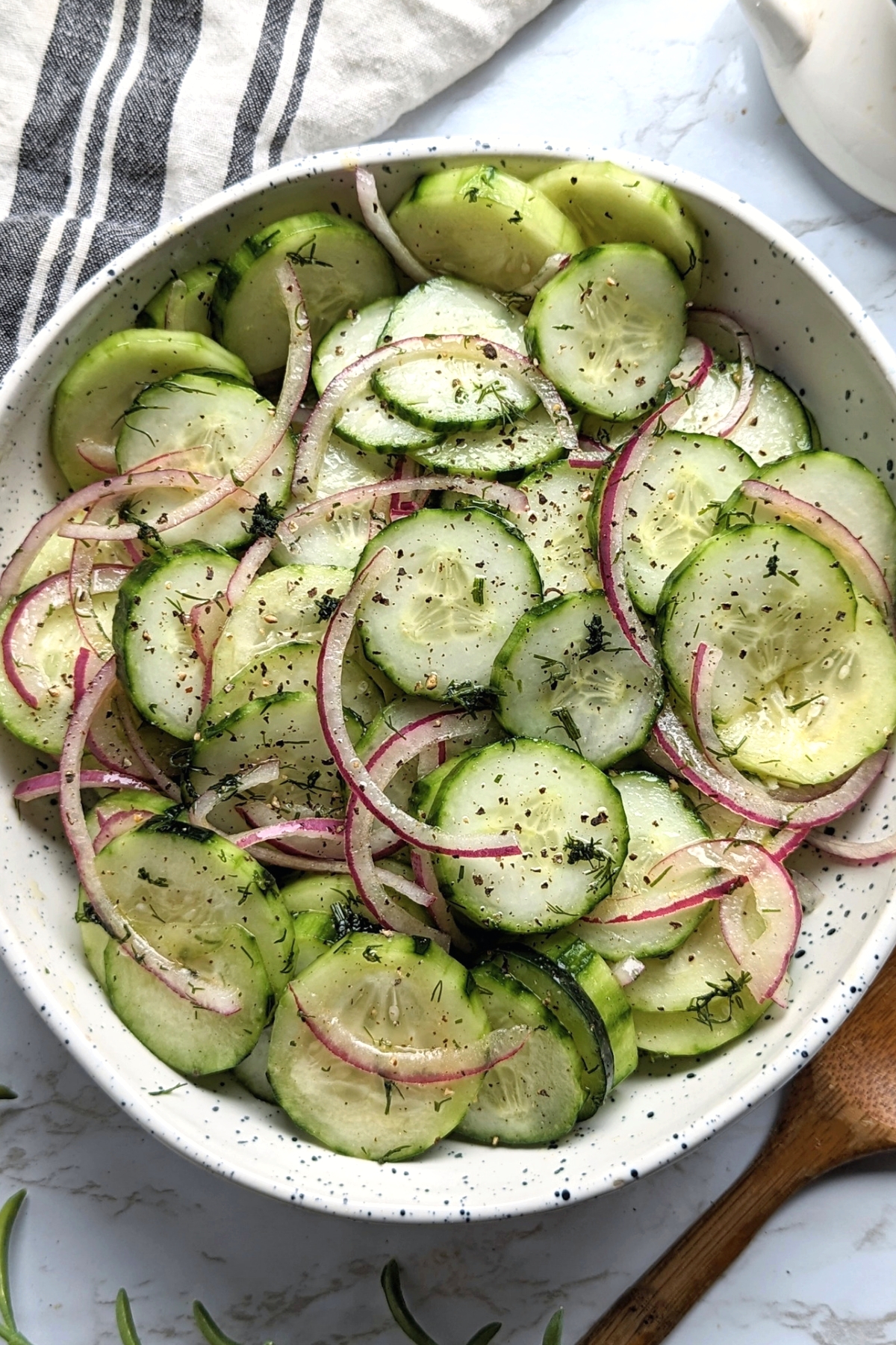 This Old Fashioned Cucumbers and Onions in Vinegar dish is an old family recipe, and our go-to summer salad for BBQs, potlucks, and parties in the summer. vegan gluten free cucumber salad recipe healthy family recipe cucumber salad great grandmas cucumber salad