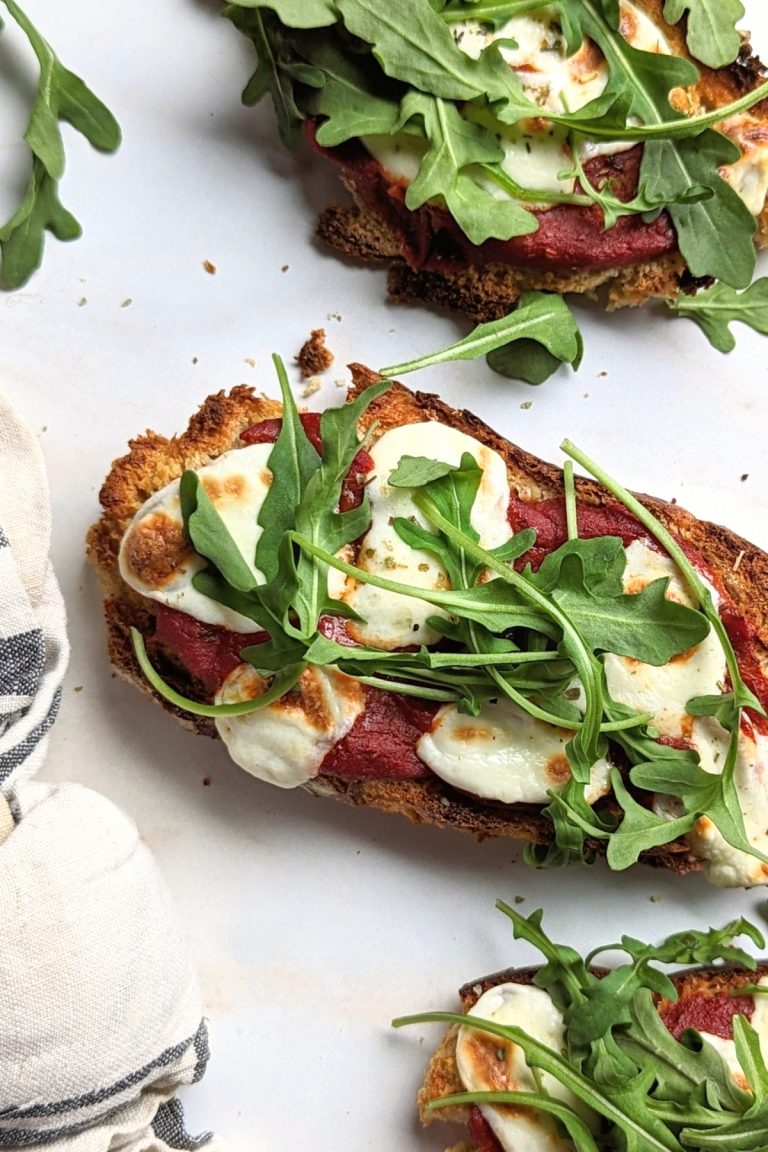 margherita pizza toast with arugula mozzarella cheese tomato sauce or pizza sauce and texas garlic toast