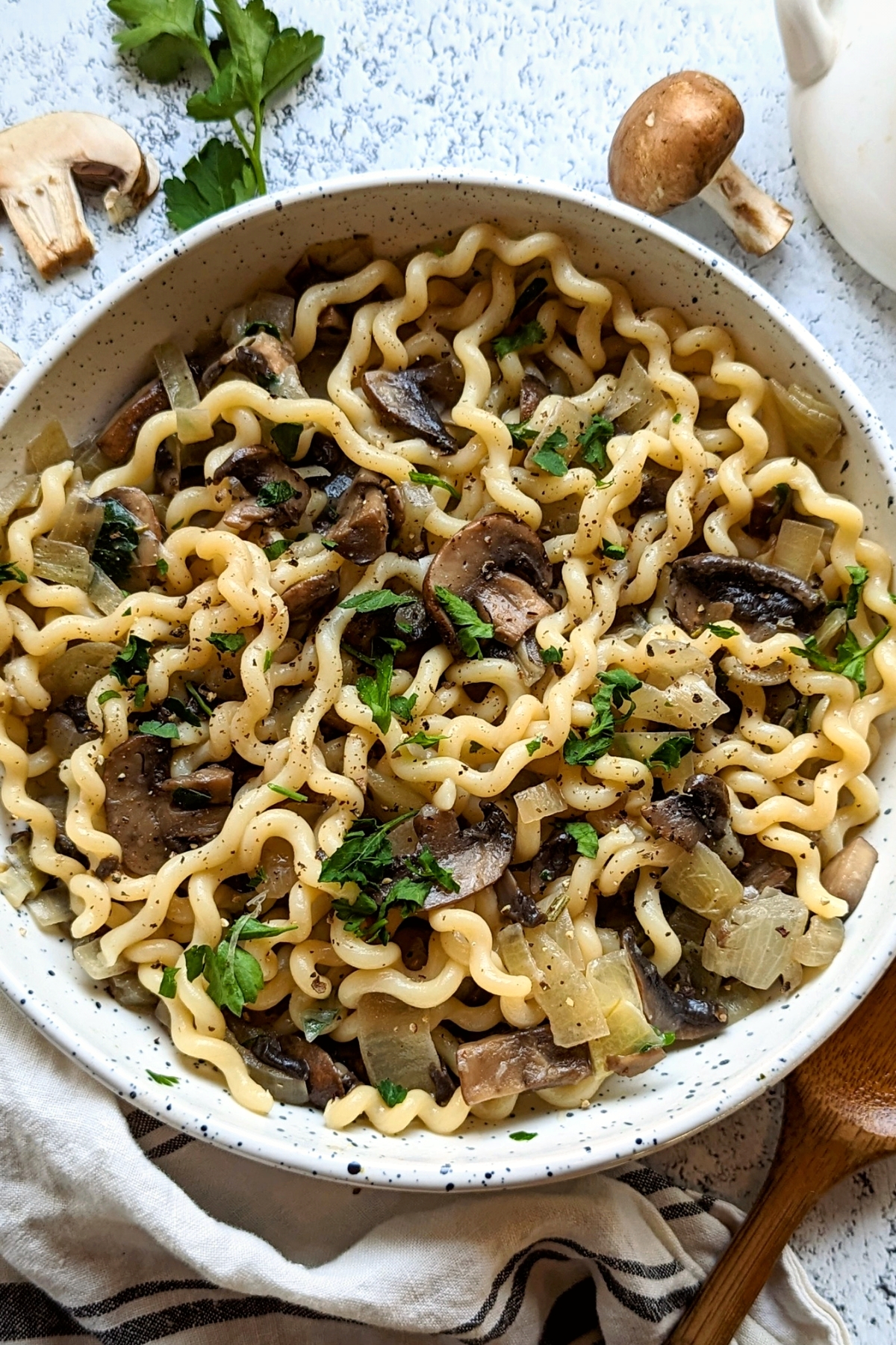 dairy free mushroom pasta recipe with garlic parsley onions and coconut milk