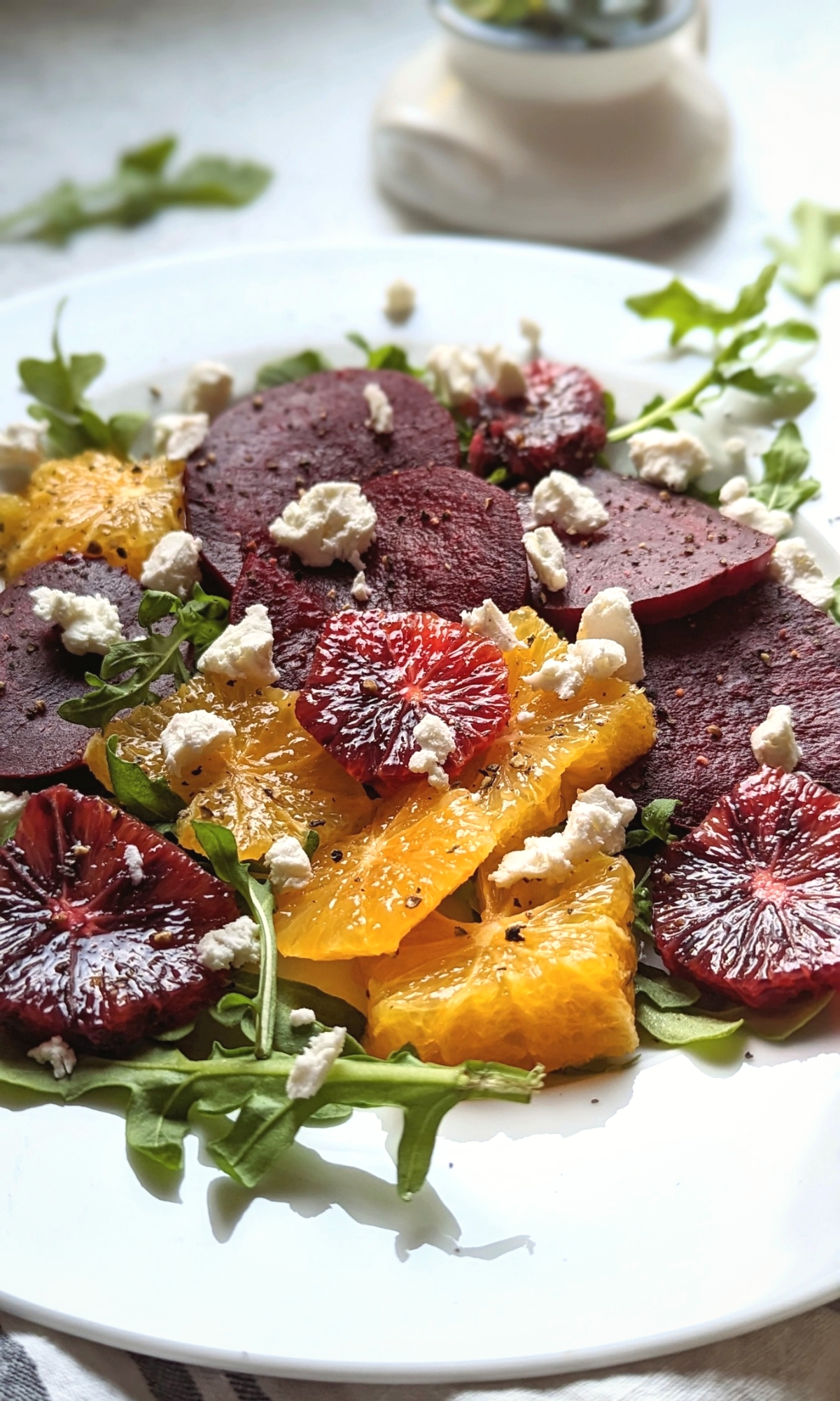 citrus beet salad recipe with goat cheese and arugula, elegant salads for entertaining guests potlucks and dinner parties