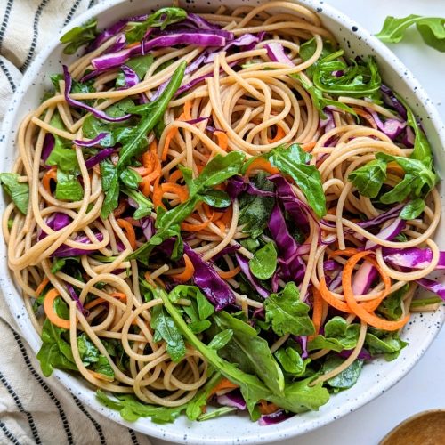 pasta salad with arugula noodles with carrots and red cabbage in a sesame honey lime dressing vegetarian potluck dishes