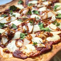pizza goat cheese topping for pizza easy baked goat cheese pizza with tomato sauce pears and homemade dough fancy pizza recipes