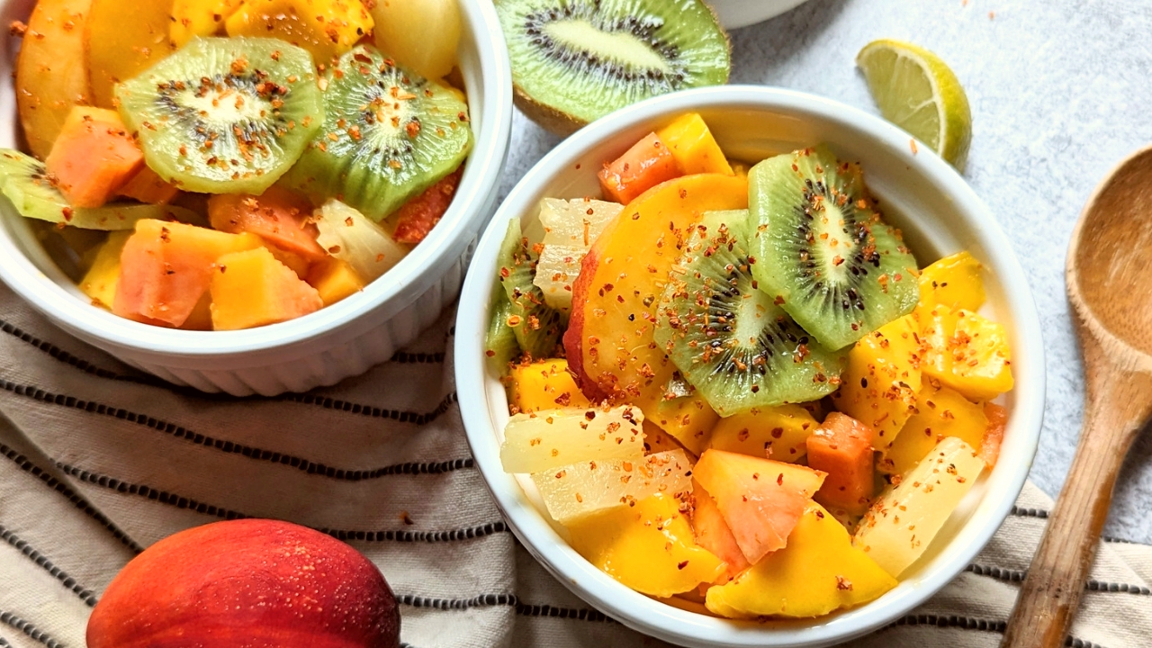 tajin fruit with mango pineapple papaya lime juice pineapple and peach fruit salad