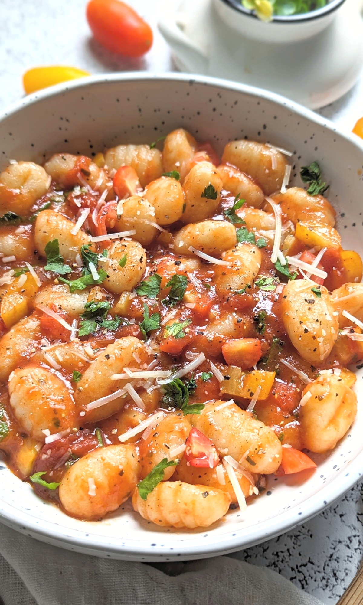 gnocchi with tomato sauce parsley parmesan cheese garlic cherry tomatoes and san marzano canned tomatoes