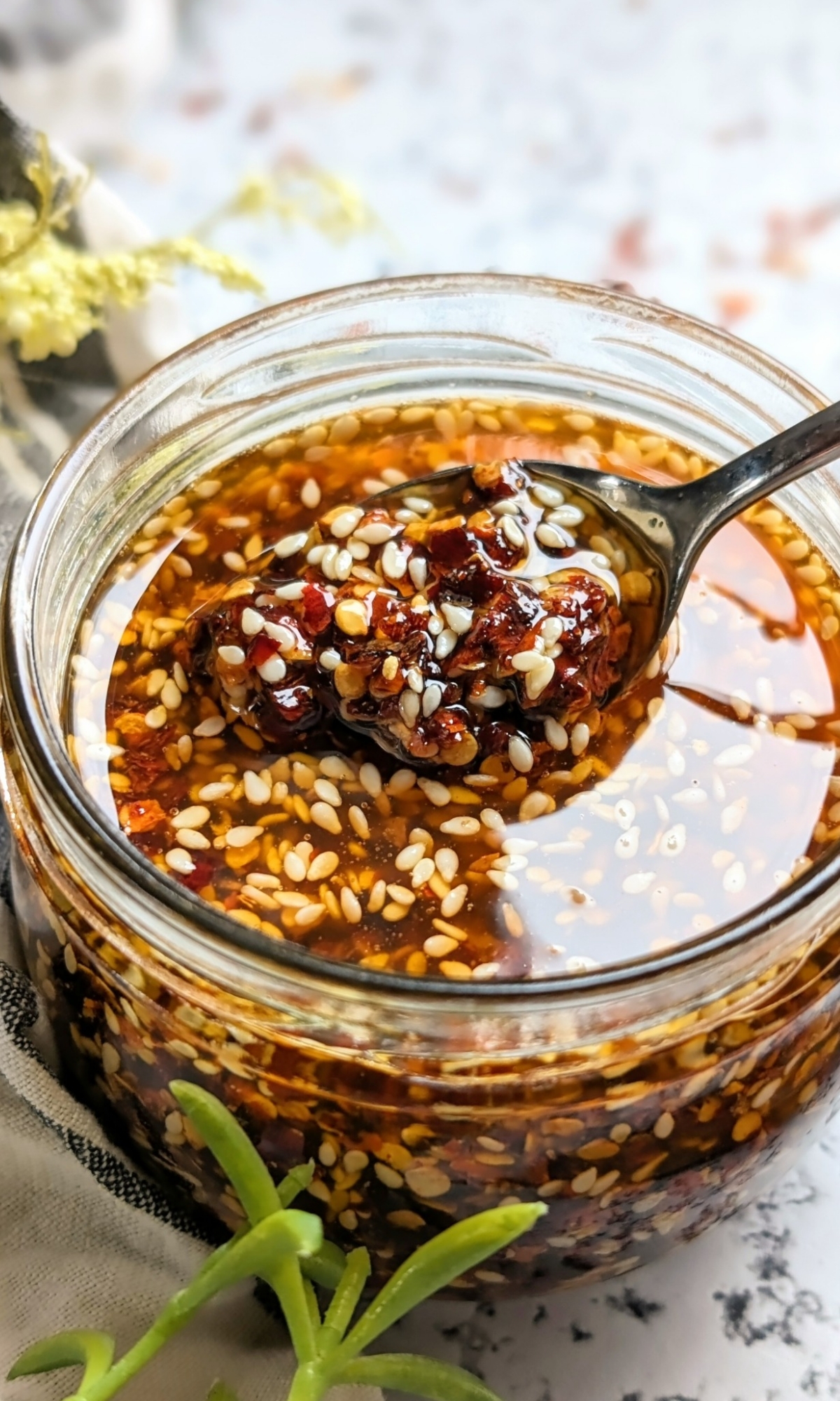 how to make chili crisp with chili flakes sesame seeds honey vegetable oil and garlic