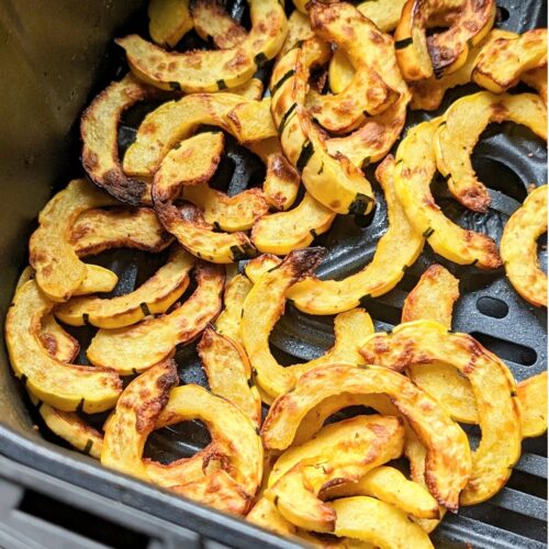 delicata squash air fryer recipe tossed with oil salt and pepper