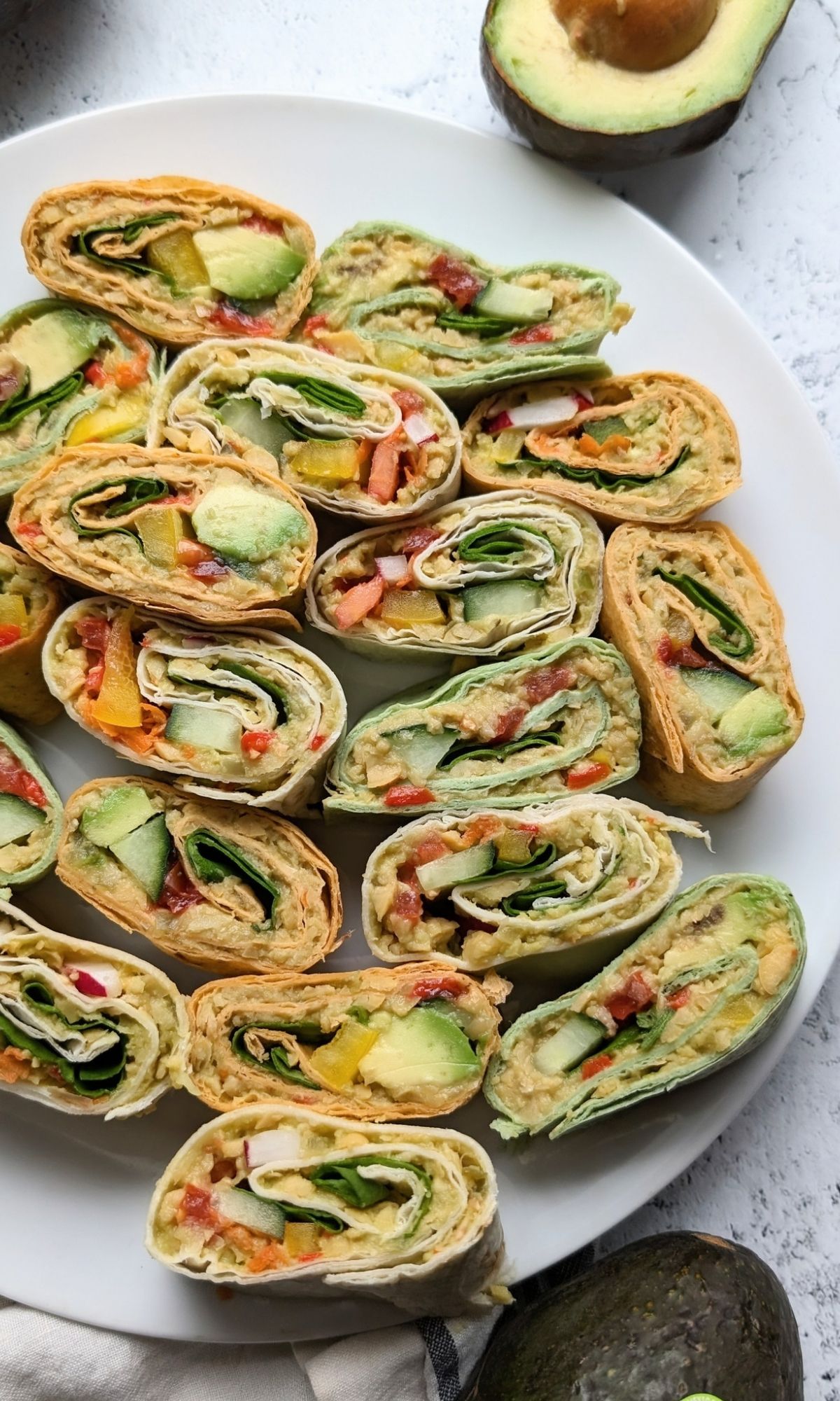 avocado chickpea pinwheels recipe with garbanzo beans high protein lunch ideas wraps and sandwiches
