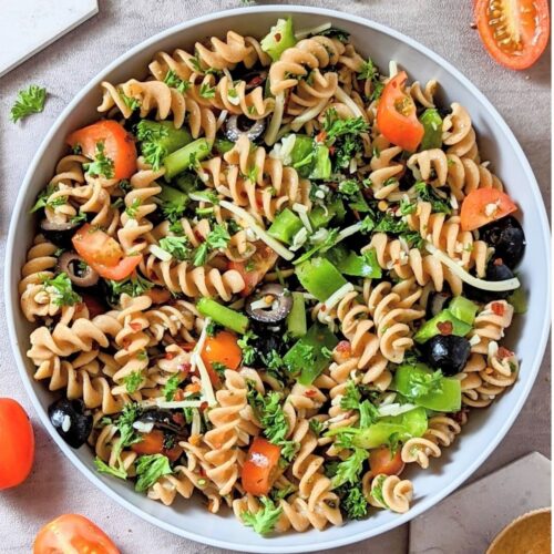 whole wheat pasta salad recipe with tomatoes olives bell peppers and cheese with italian dressing