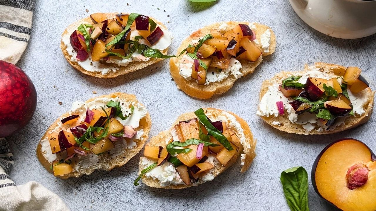 fancy plum appetizer recipes served on toast spread with plain chevre goat cheese honey olive oil and balsamic vinegar
