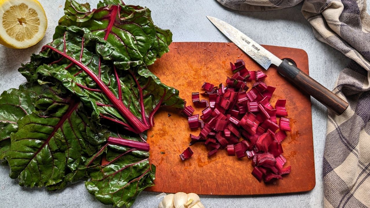 swiss chard with red stems rainbow chard with bright green leaves and dark red stems chopped and separated