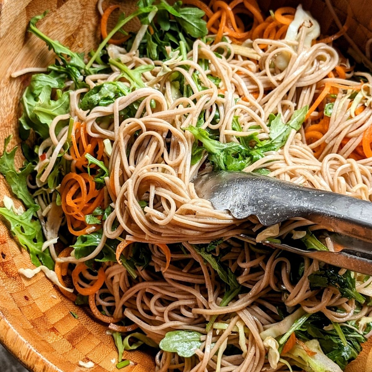 salad with soba noodles and a spicy chili dressing with fresh chopped vegetables